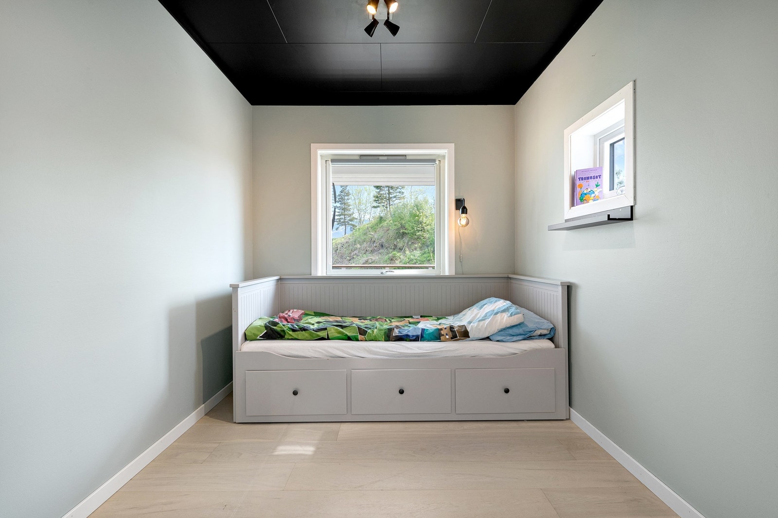 Bod innredet som soverom Galleribilde