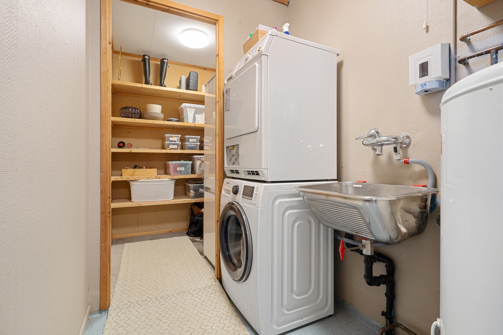 Boligen disponerer eget vaskerom. Galleribilde