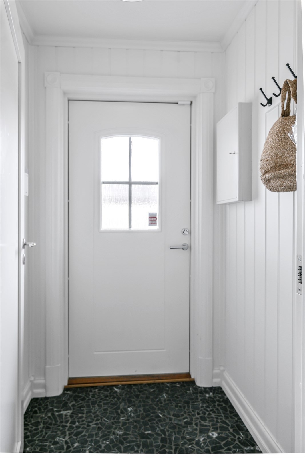 Velkommen inn i et innbydende vindfang. Galleribilde