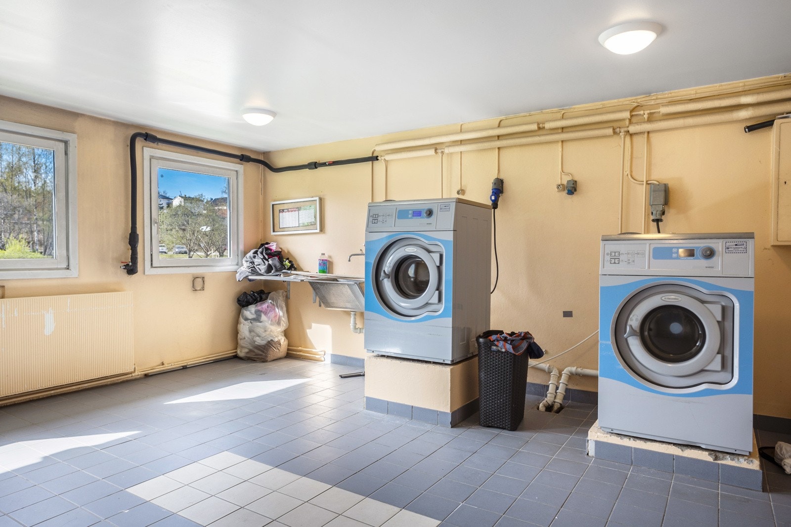 Borettslaget har fellesvaskerier for beboere til å benytte seg av. Galleribilde