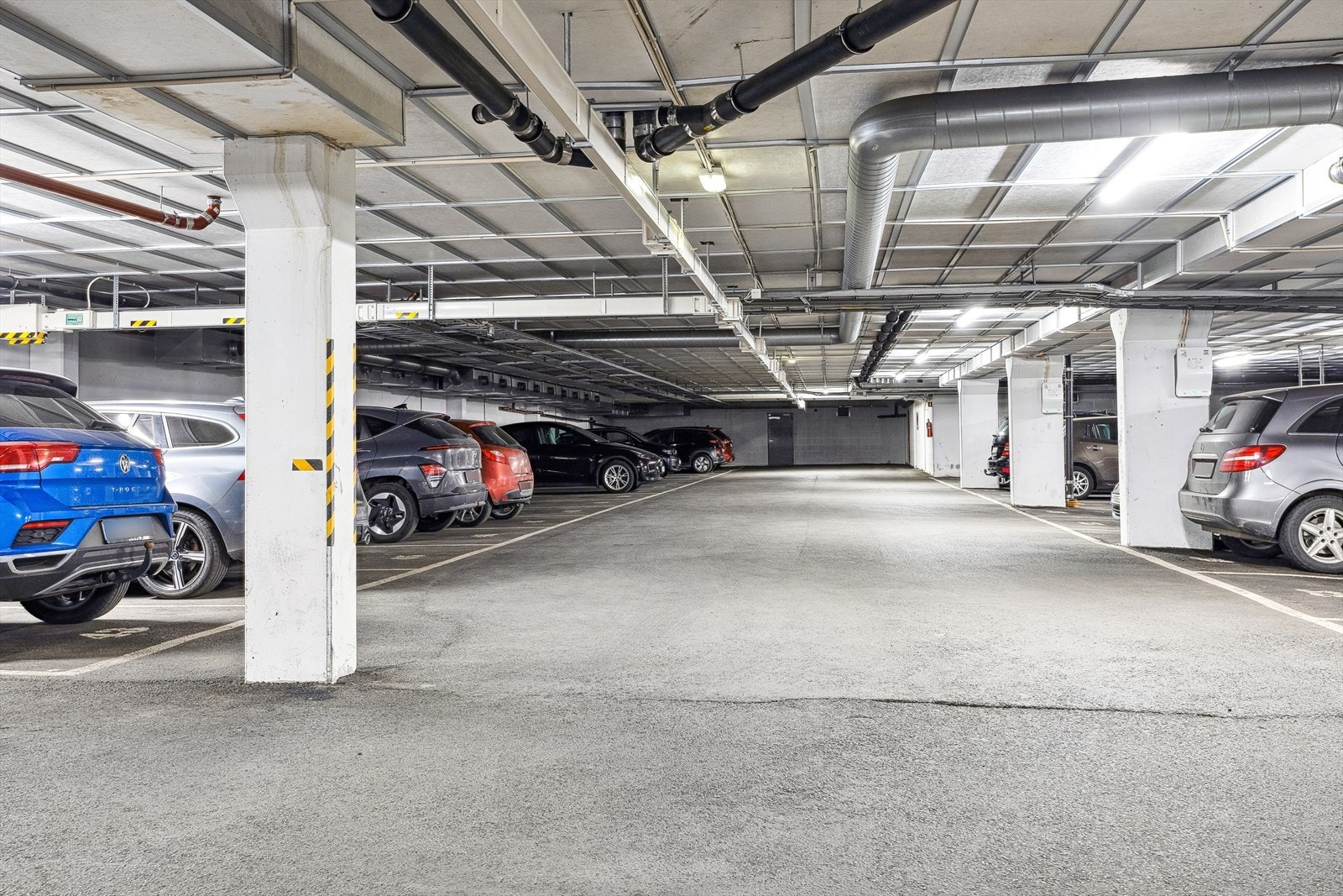 Tidvis mulighet for leie av garasjeplass med heisadkomst ned til garasjeplan for boligplan. Galleribilde