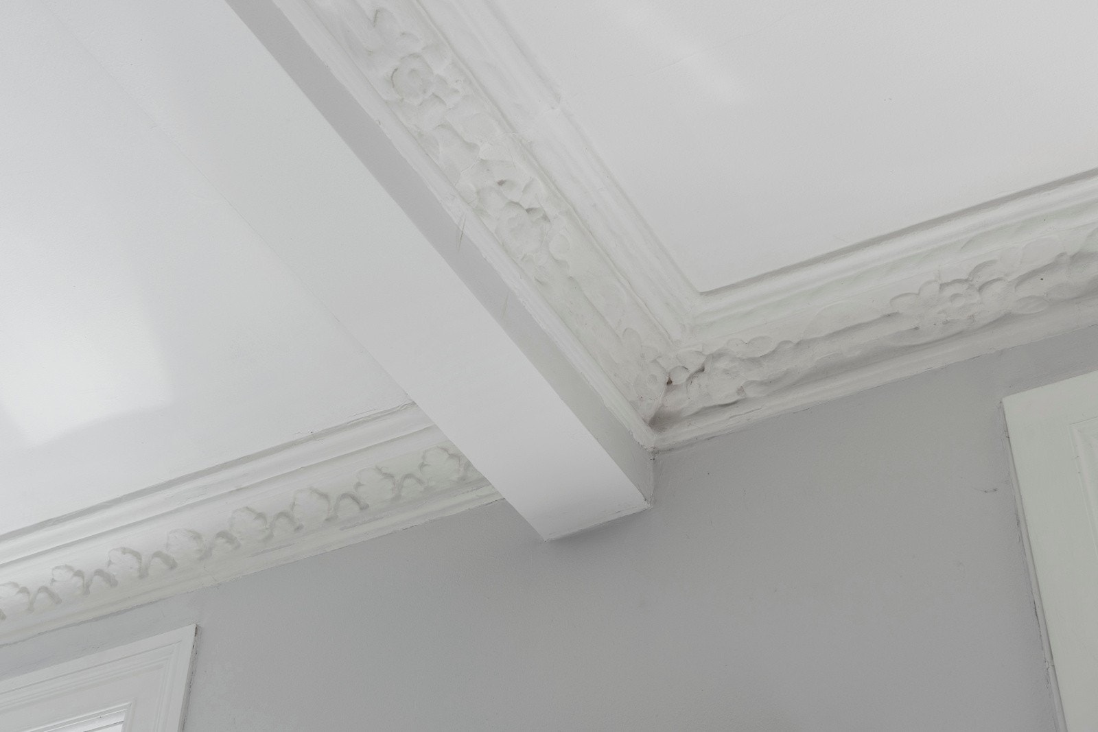 Flotte detaljer med rosett og stukkatur Galleribilde