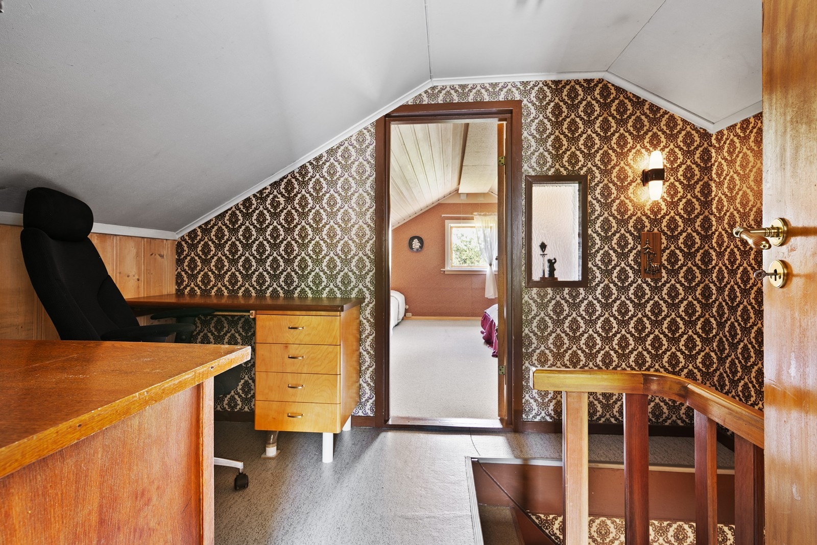 I andre etasje er det to soverom Galleribilde