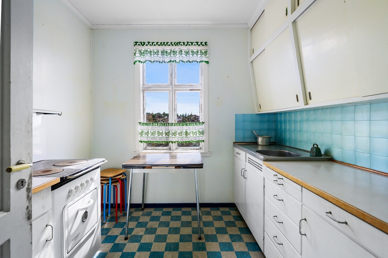 Sjarmerende plassbygd kjøkken. Galleribilde