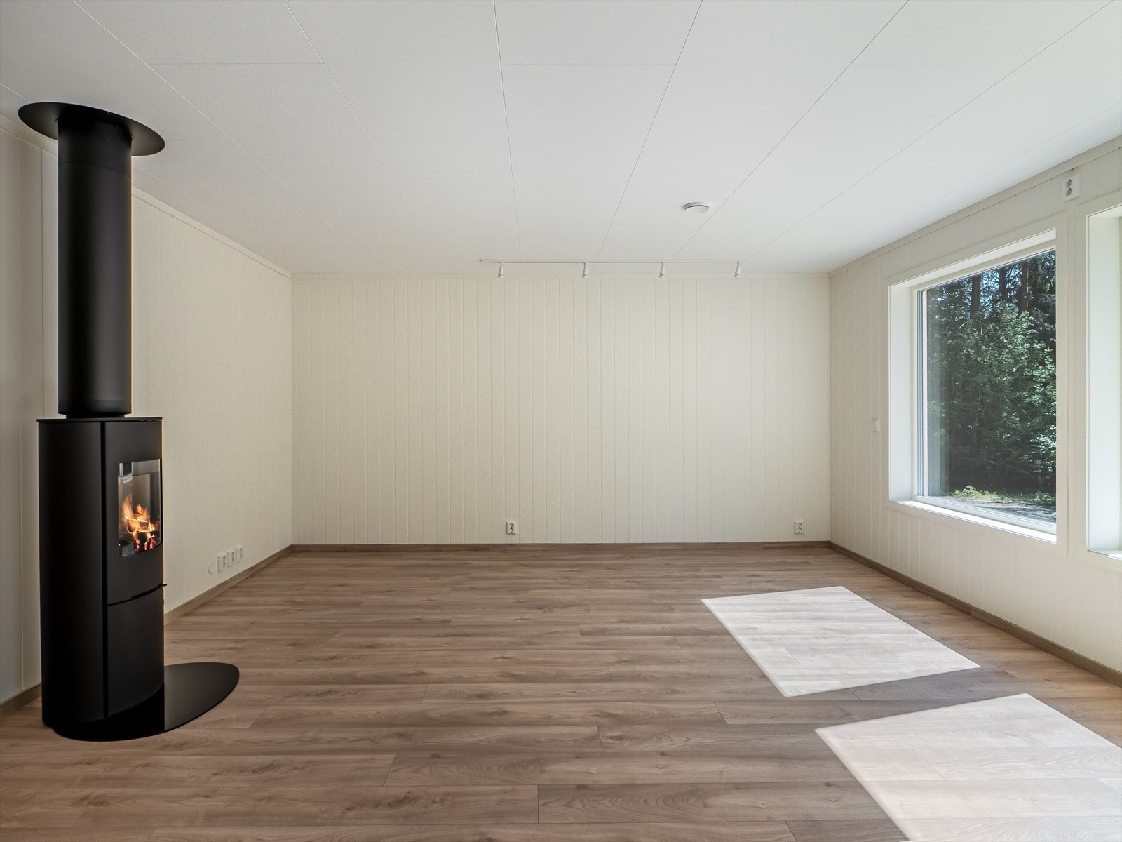 I stuen er det god plass til sofagruppe. Galleribilde