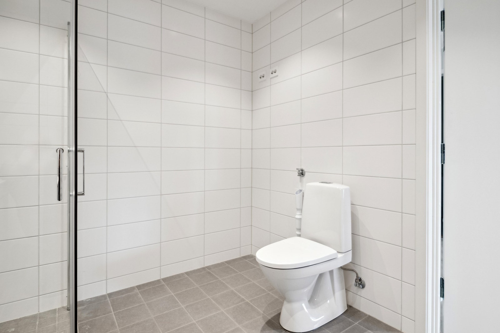 Badet har opplegg for vaskemaskin. Galleribilde