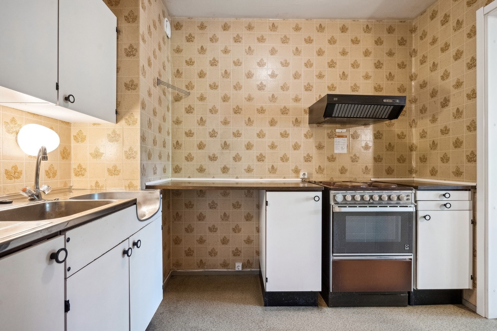 Kjøkkenet har en delvis separat plassering i hjemmet rett ved stuen. Galleribilde