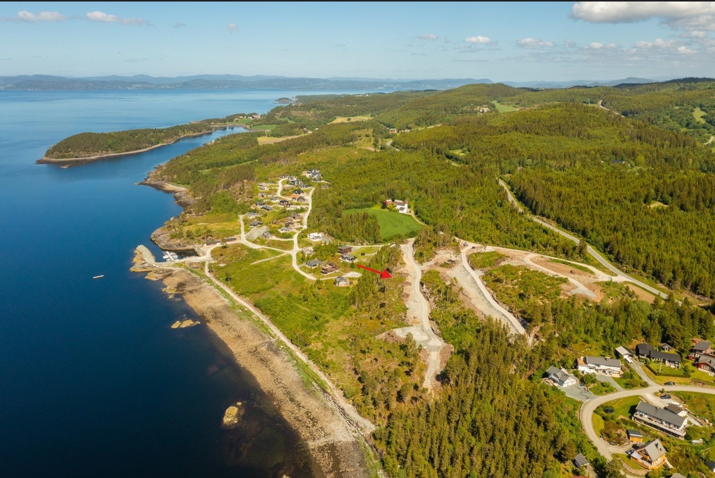 Svaberget 7 er markert med rød pil Galleribilde