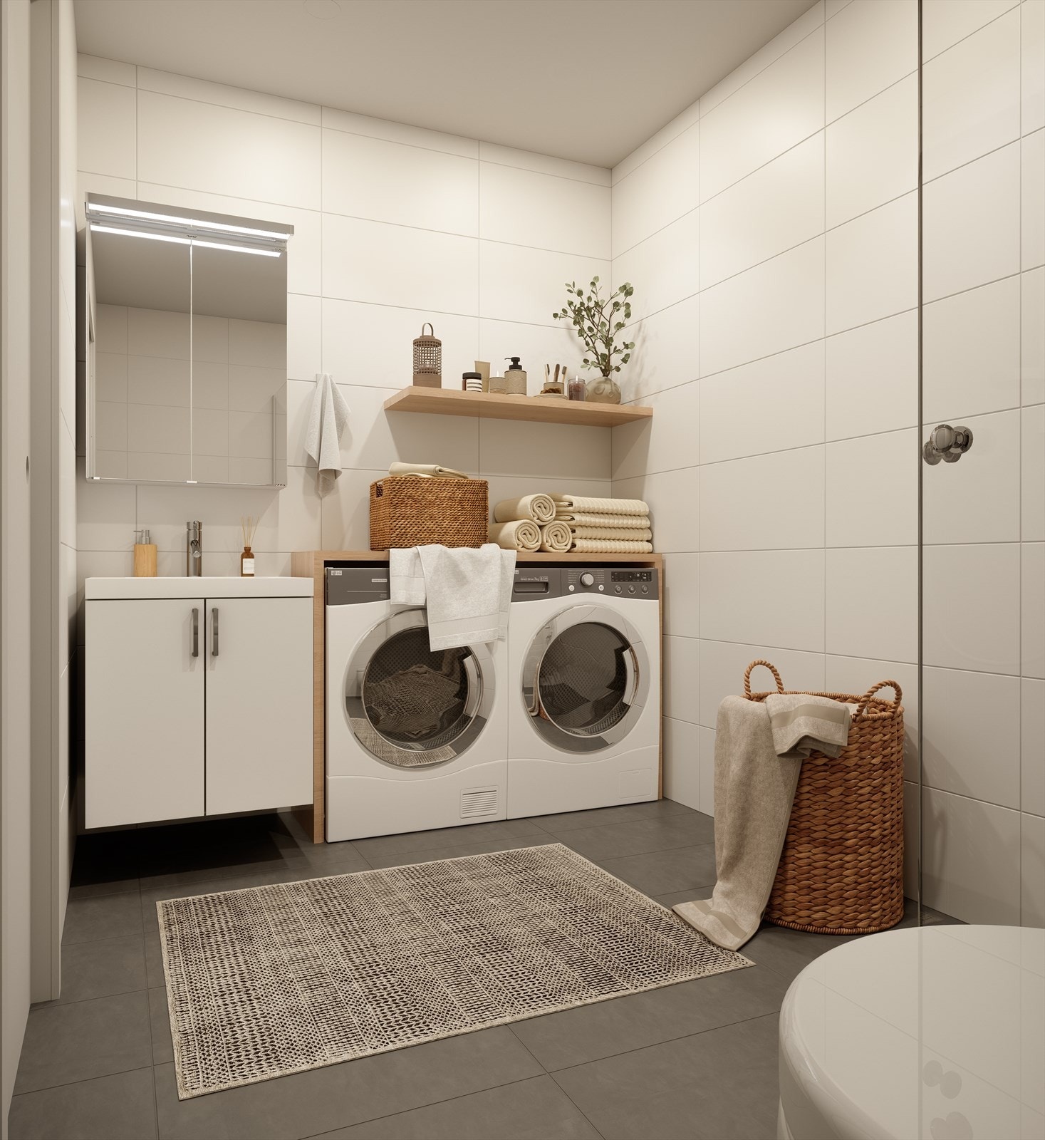 Illustrasjon av baderom/vaskerom til 3-4 roms leilighetene. Baderommet blir levert med samme leveranse som baderom med vegghengt toalett og servant med baderomsinnredning i standard hvit utførelse. Opplegg for vaskemaskin og kondenstørketrommel. Galleribilde