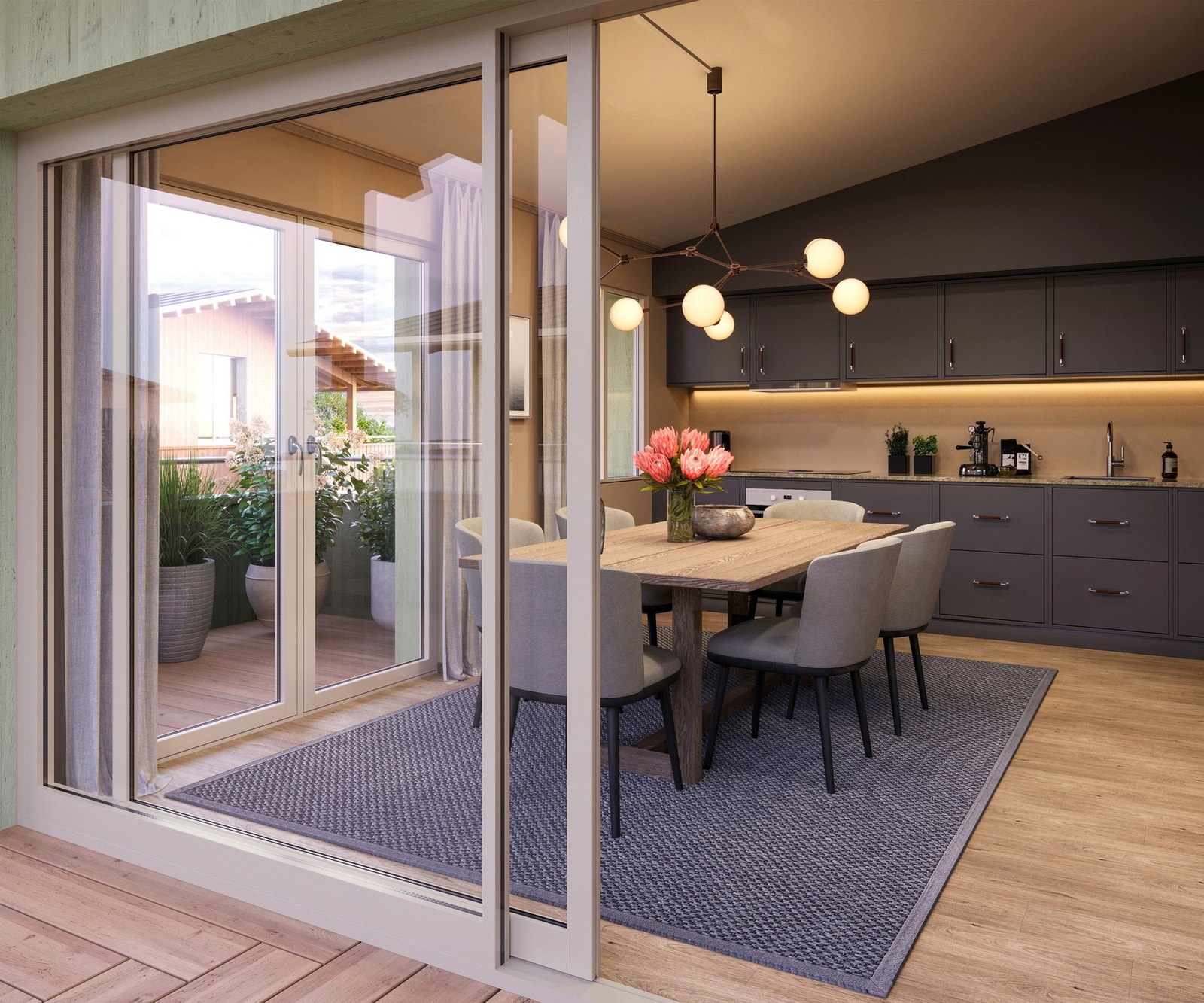 Skyvedører gir god romfølelse, og forlenger stuen på sommerstid. Galleribilde