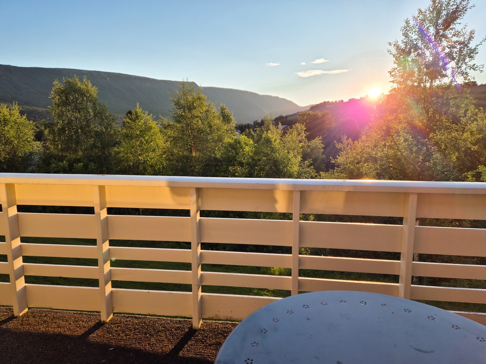 Solnedgang fra balkongen. Galleribilde