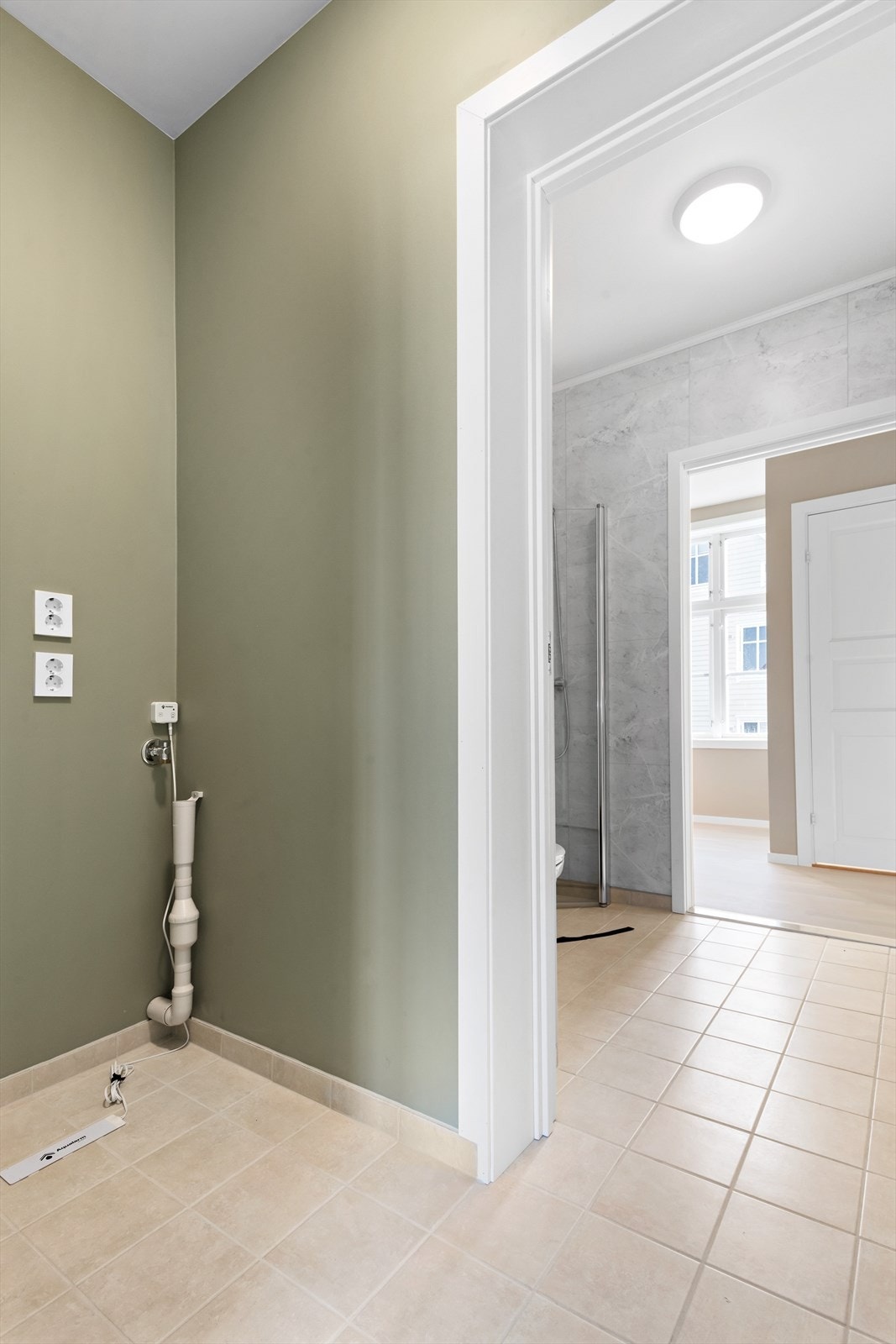Vaskerom i tilknytning til badet. Galleribilde