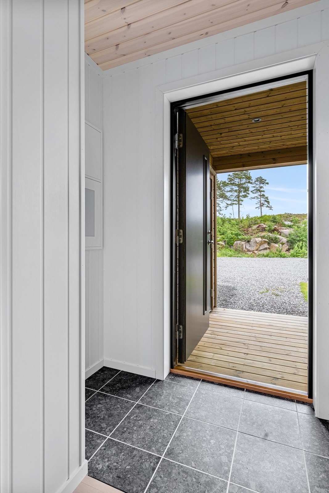 Fin og lys entré med fliser Galleribilde