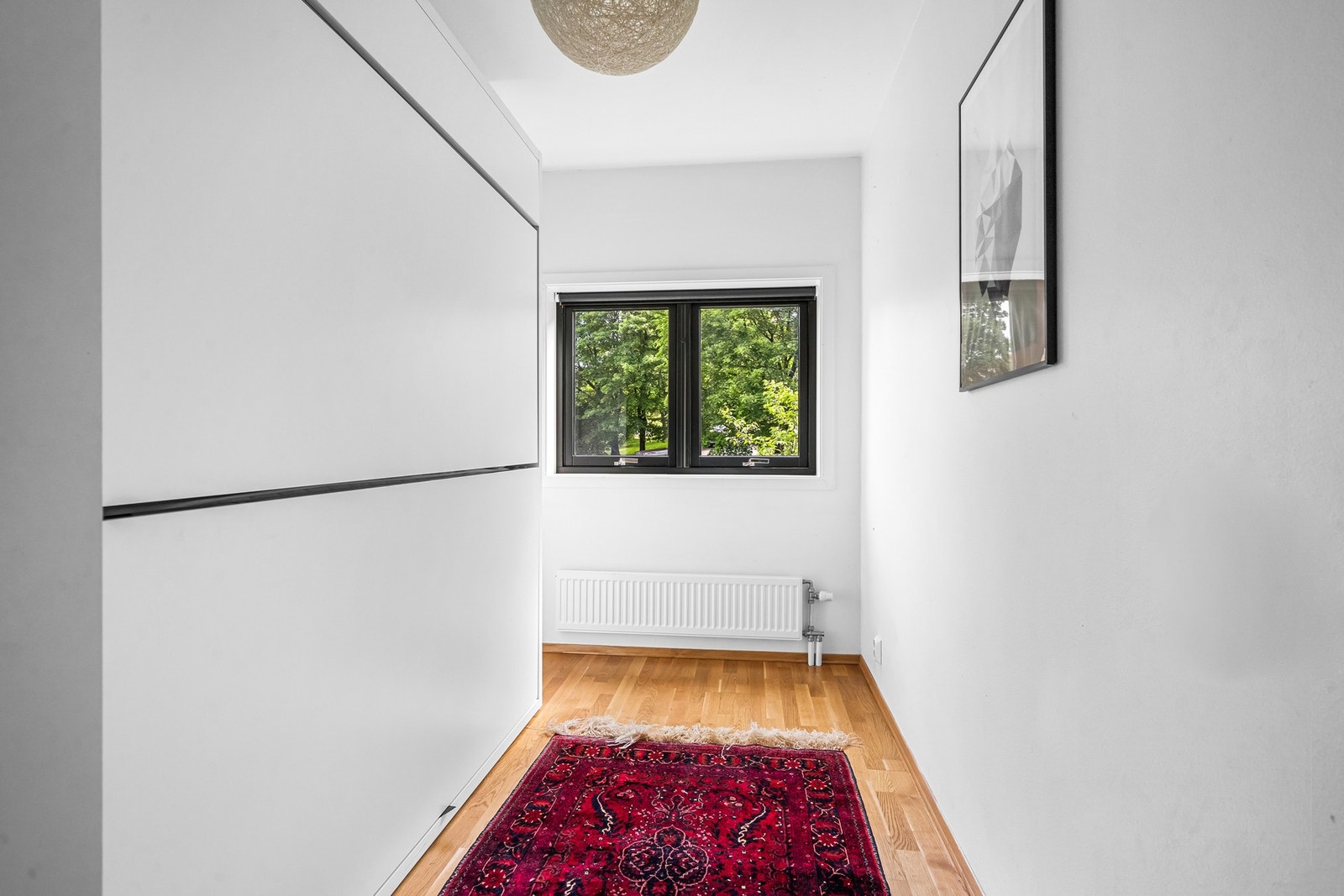 Soverom 2 fungerer som kombinert hjemmekontor og gjesterom. Galleribilde