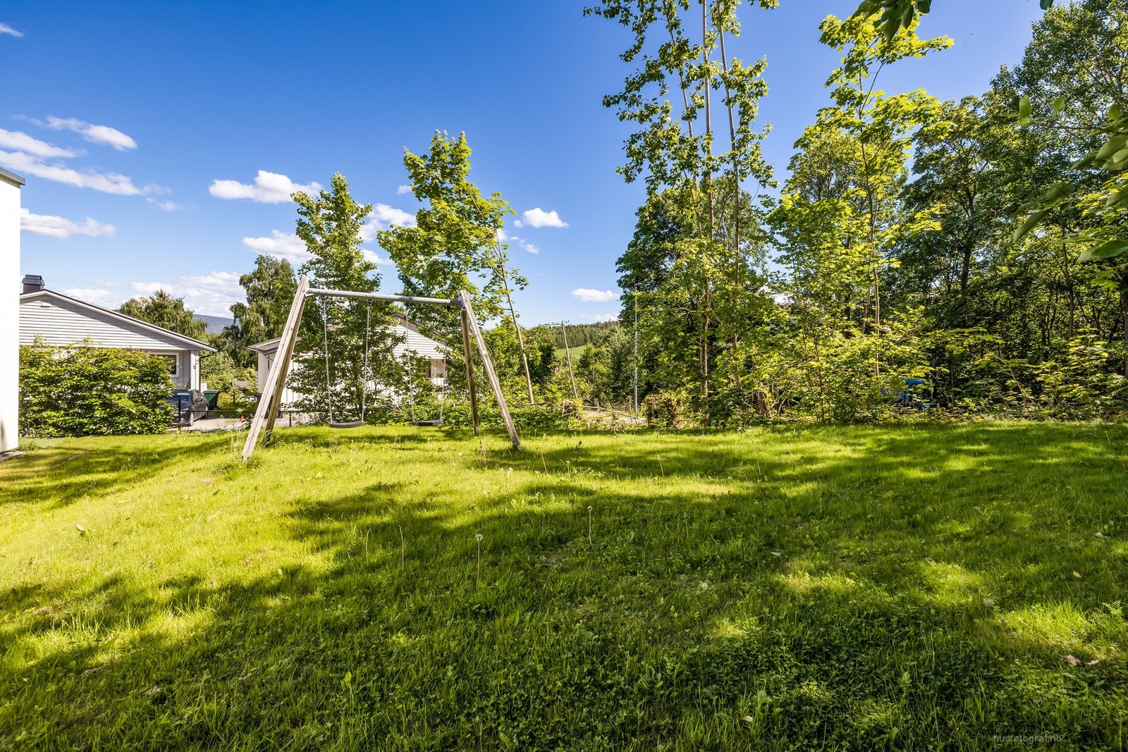 Det er også en liten felles hage i enden av feltet. Galleribilde