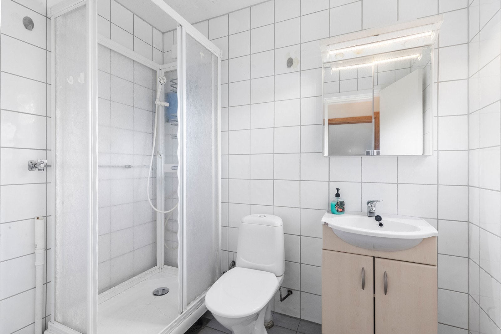 Pent flislagt bad Galleribilde