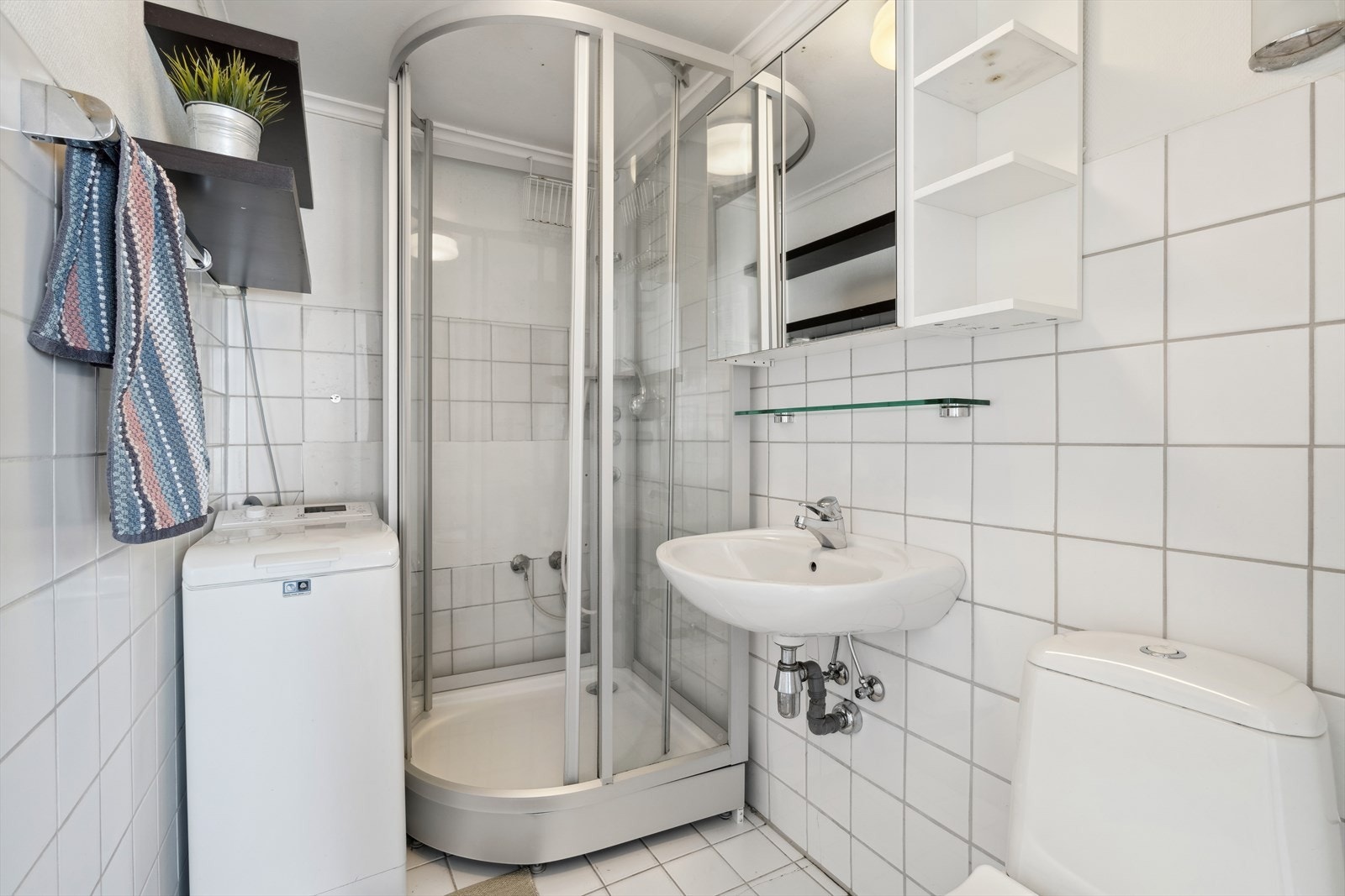 Bad/wc med opplegg for vaskemaskin. Galleribilde