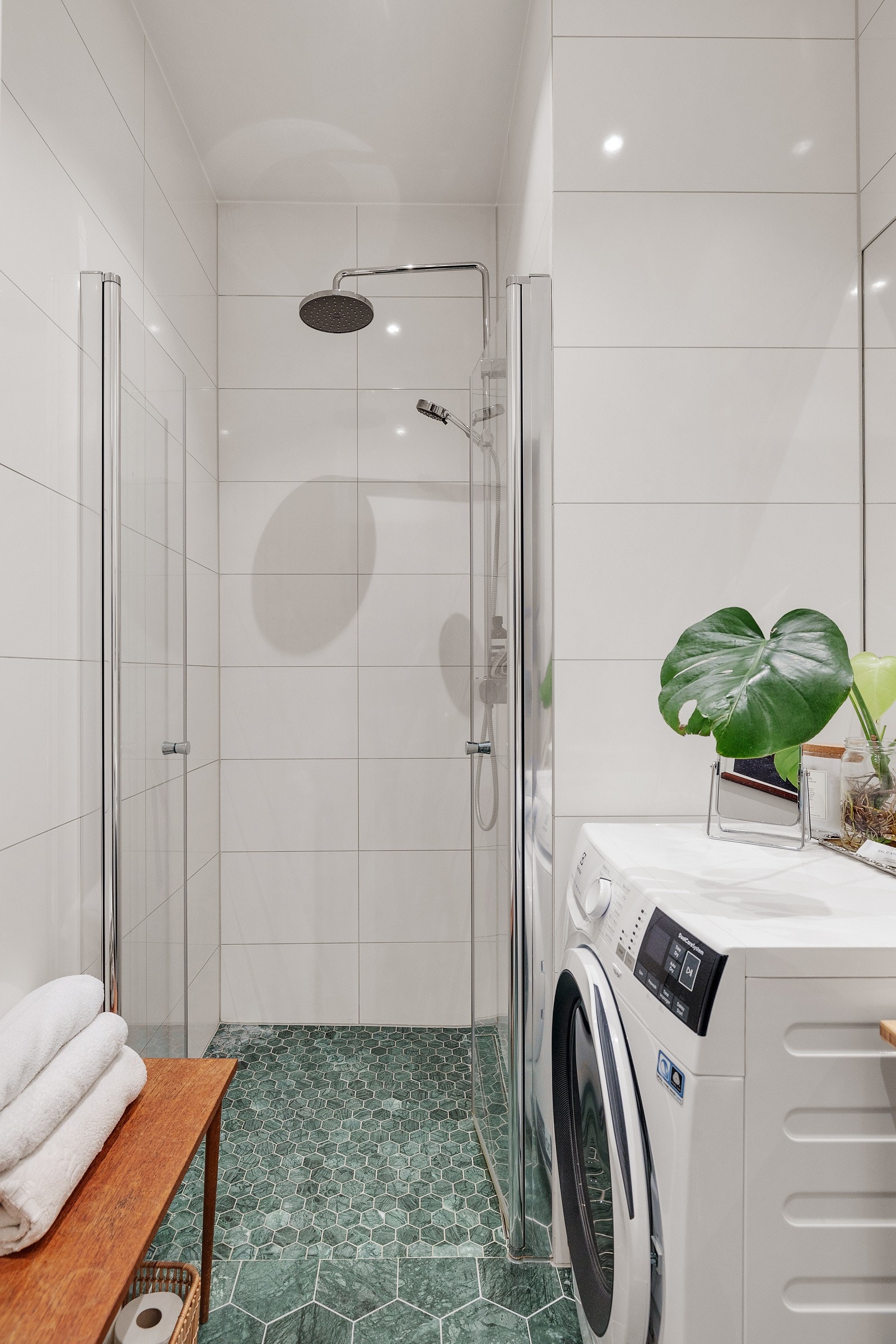 Badet har opplegg for vaskemaskin. Galleribilde