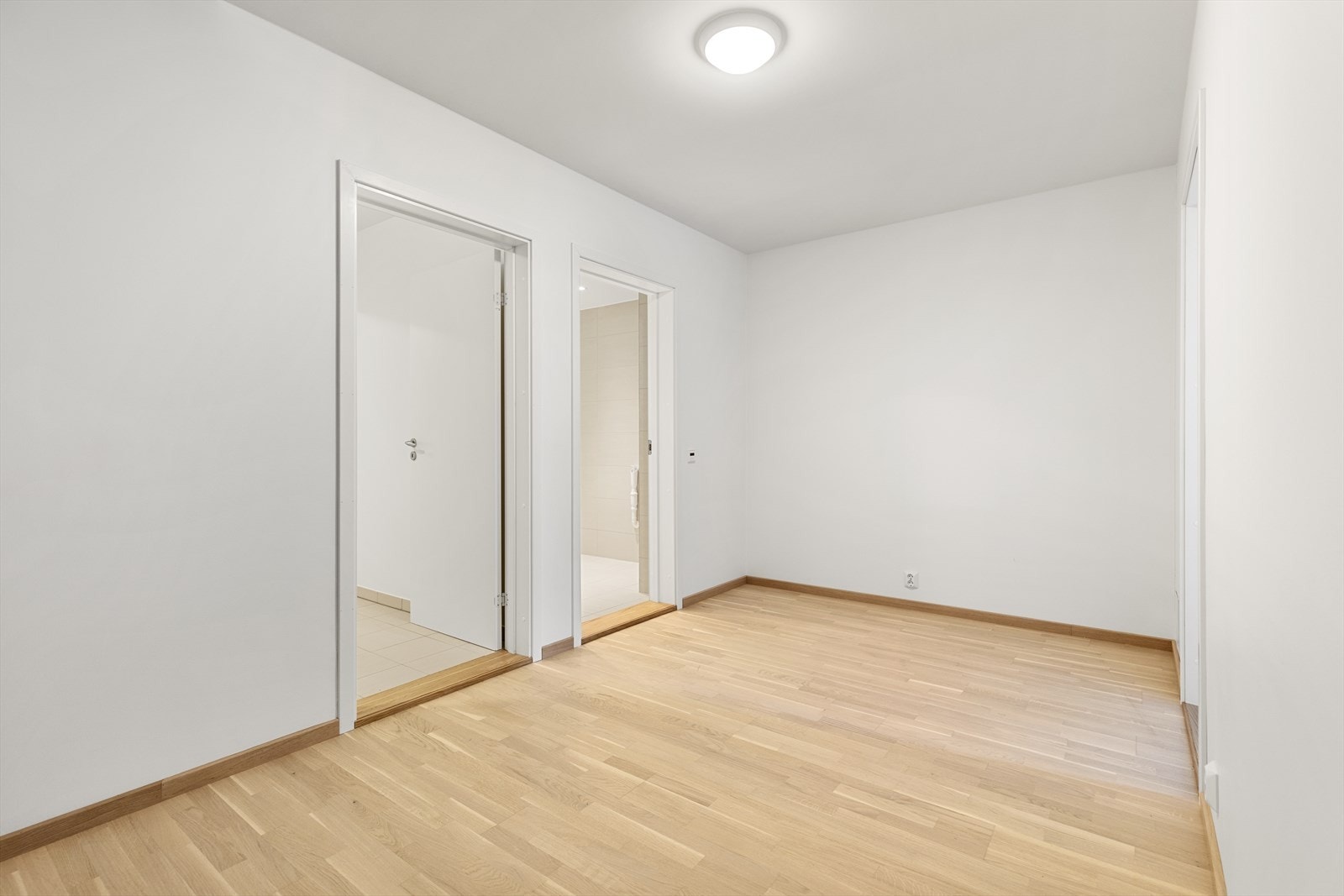 Romslig gang som kan innredes på flere forskjellige måter. Galleribilde