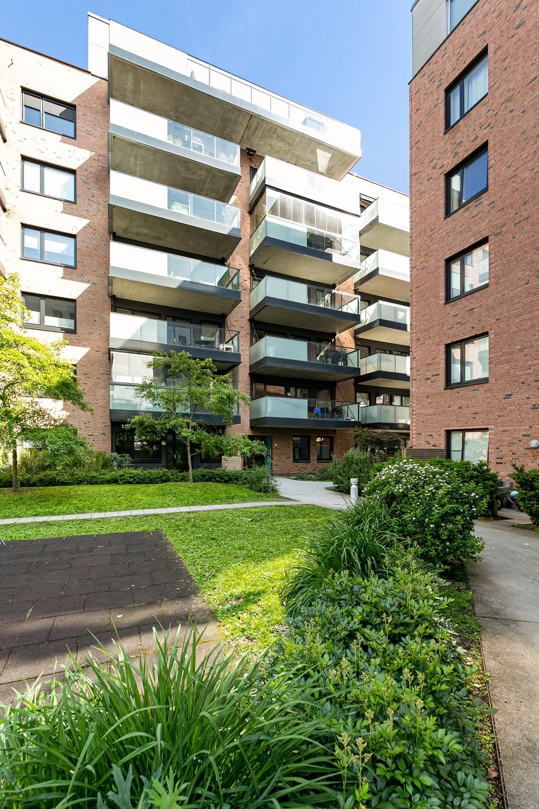 Fra hyggelige fellesareal er det enkel adkomst via heis til leiligheten som ligger i 4. etasje. Galleribilde