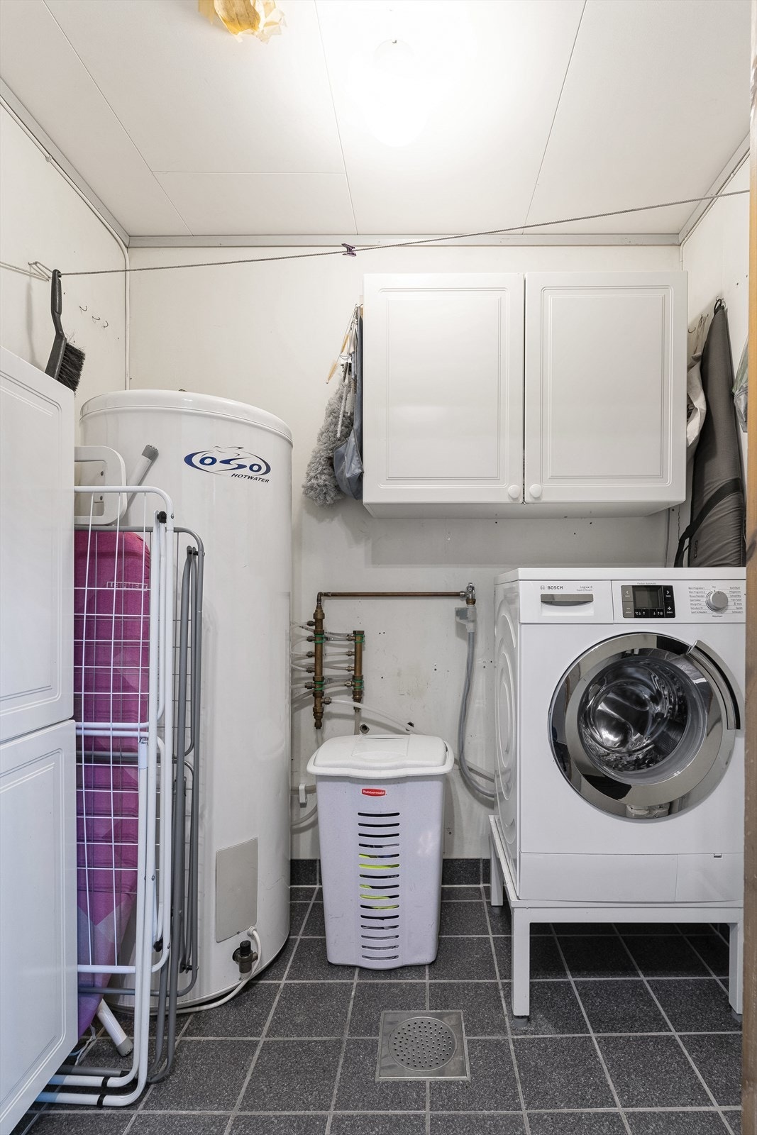 Vaskerommet ble oppgradert med ny membran og fliser på gulvet i 2006. Varmekabler i gulv. Galleribilde