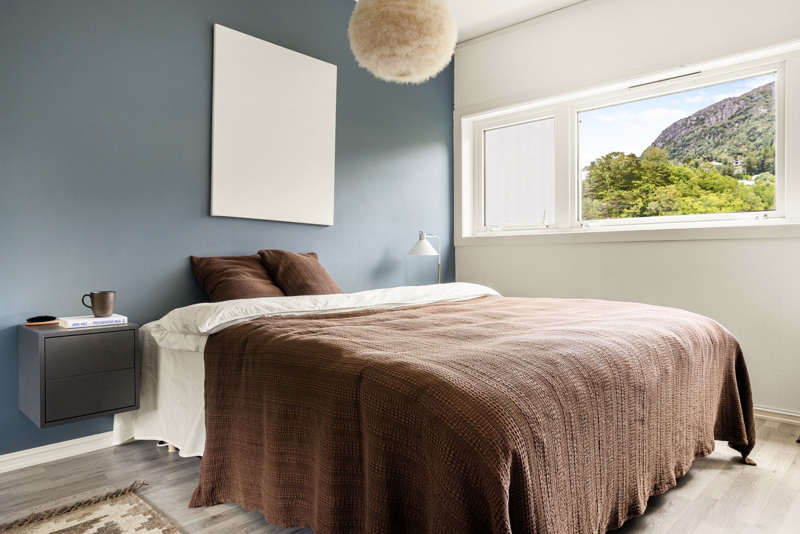 Leiligheten har to soverom der begge er malt i behagelige fargetoner. Galleribilde