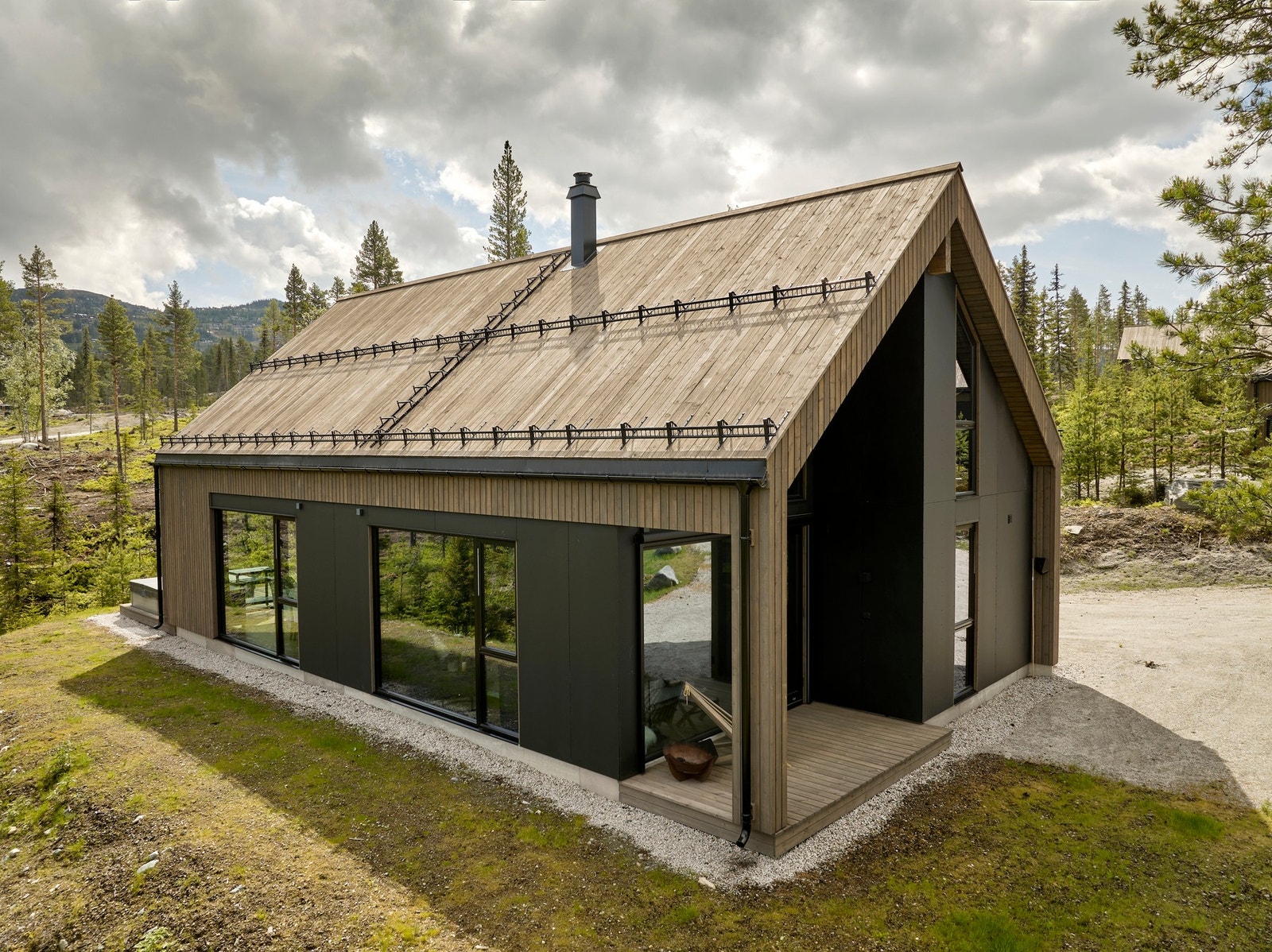 Tilnærmet vedlikeholdsfritt tak, fasade og terrassegulv, fra Concise Collection fra Talgø / MøreRoyal Galleribilde