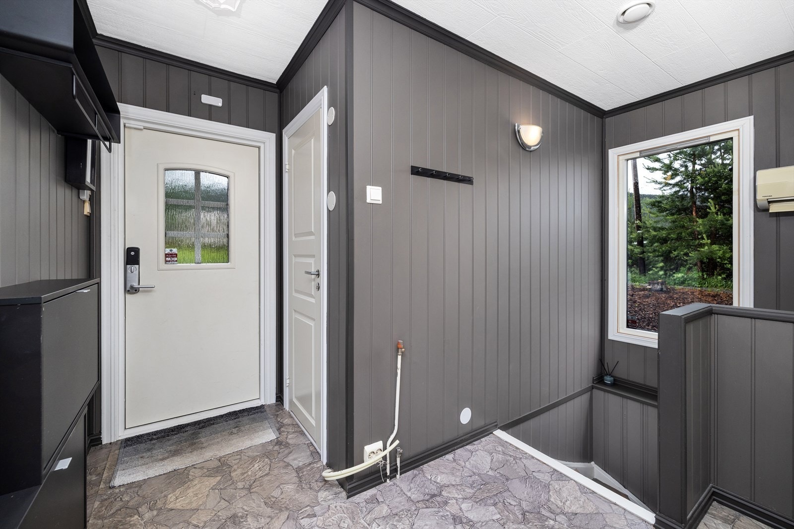 Det er et fint bad ved entréen Galleribilde