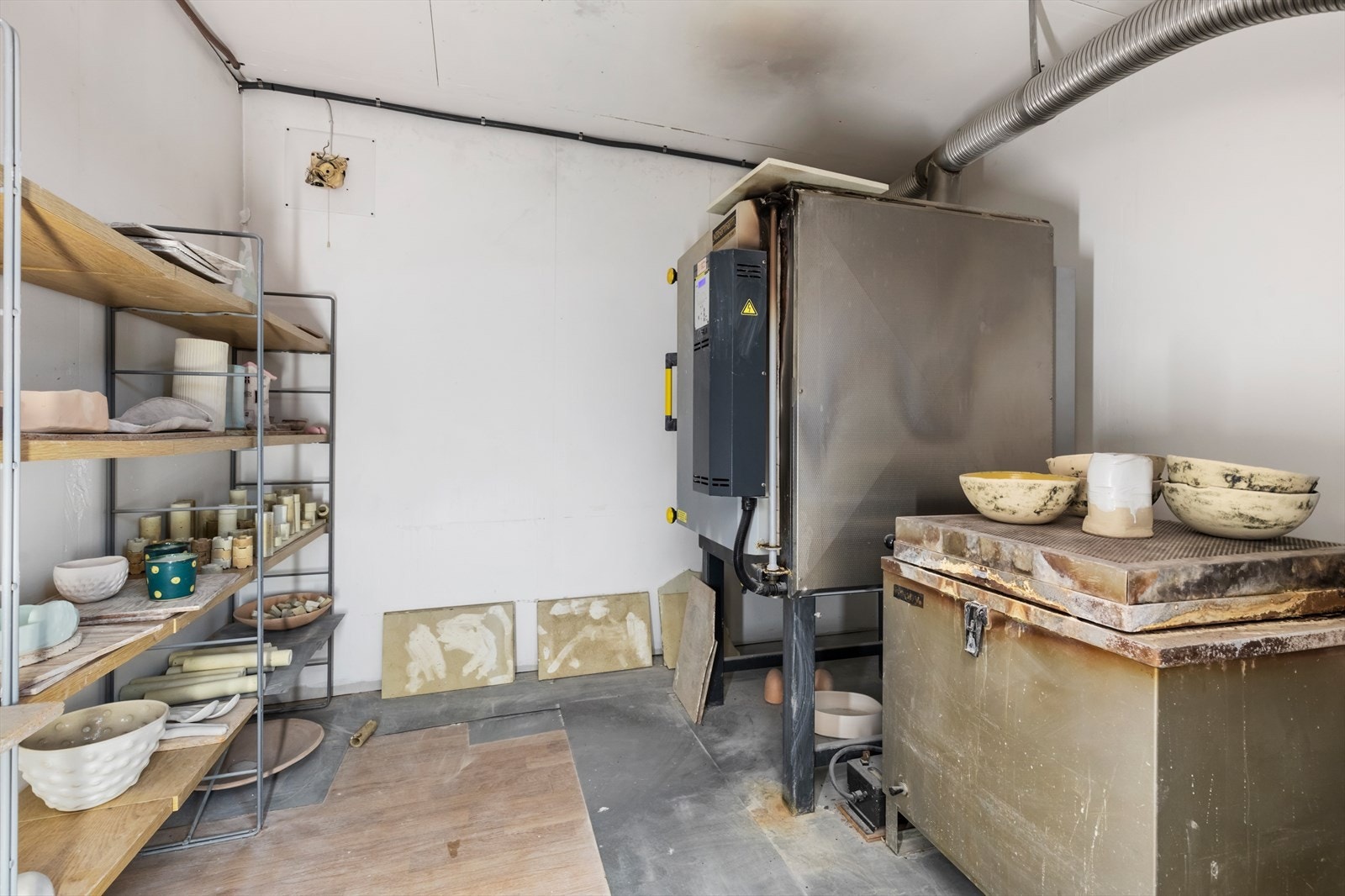 Butikken har en stor ovn i denne etasjen Galleribilde