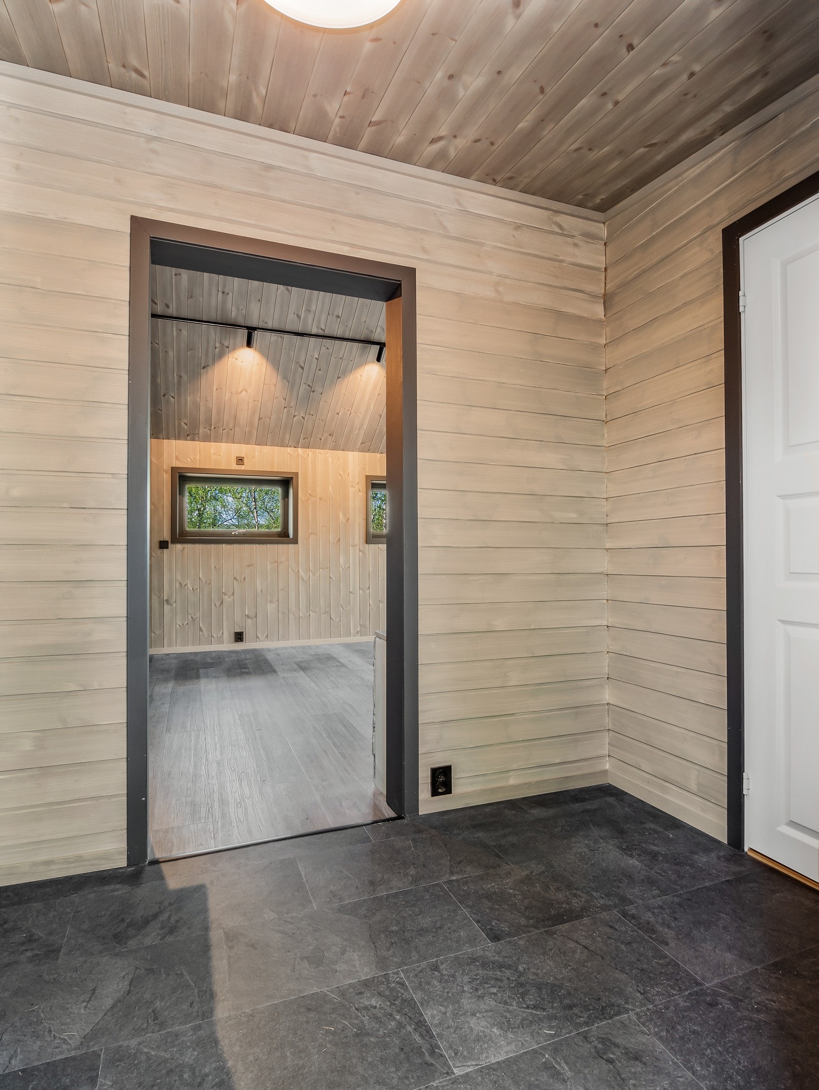 Fra vindfanget kommer man inn i stuen Galleribilde