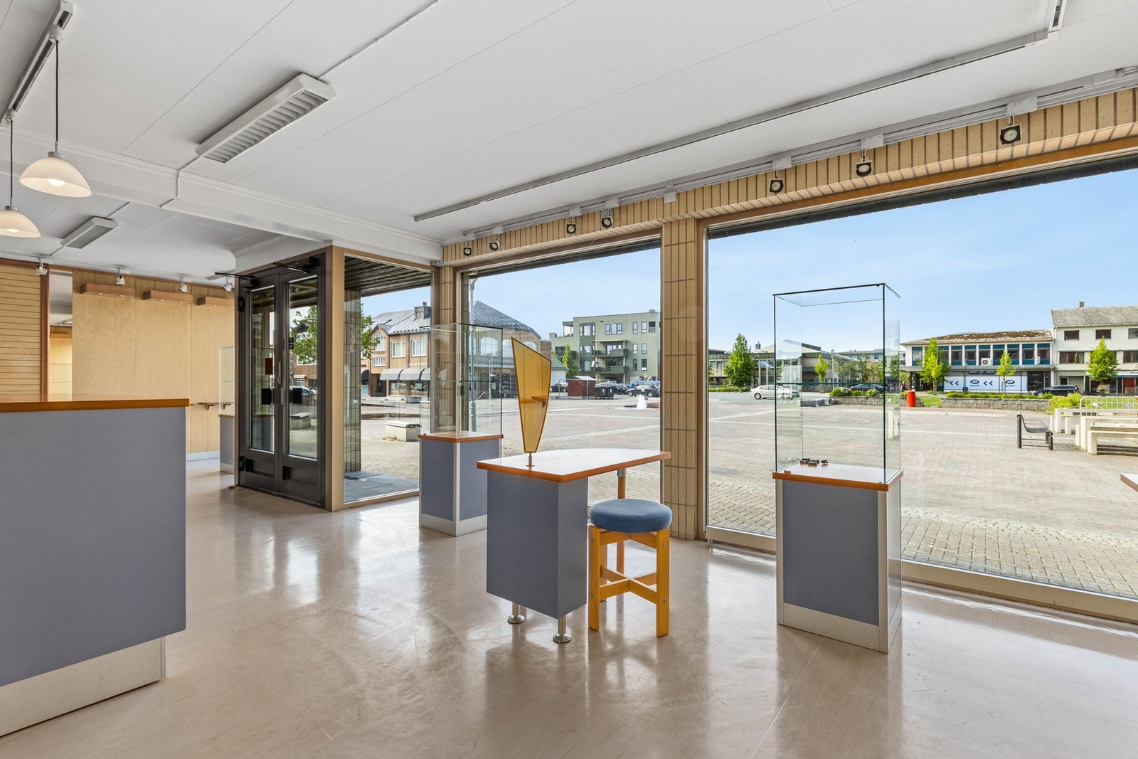 Butikk. Grenser til Minsaas plass Galleribilde