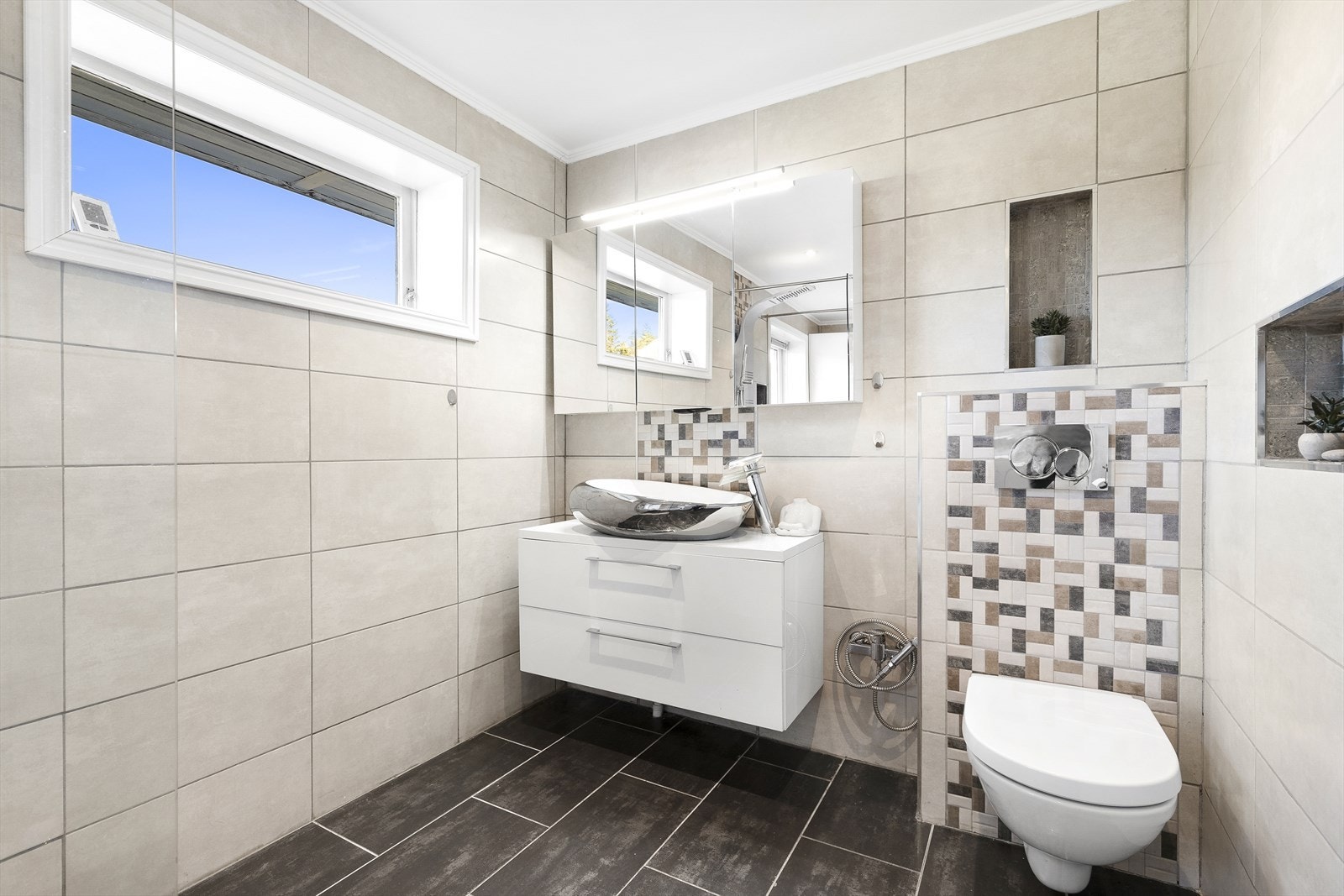 Badet er stort og innholdsrikt. Galleribilde