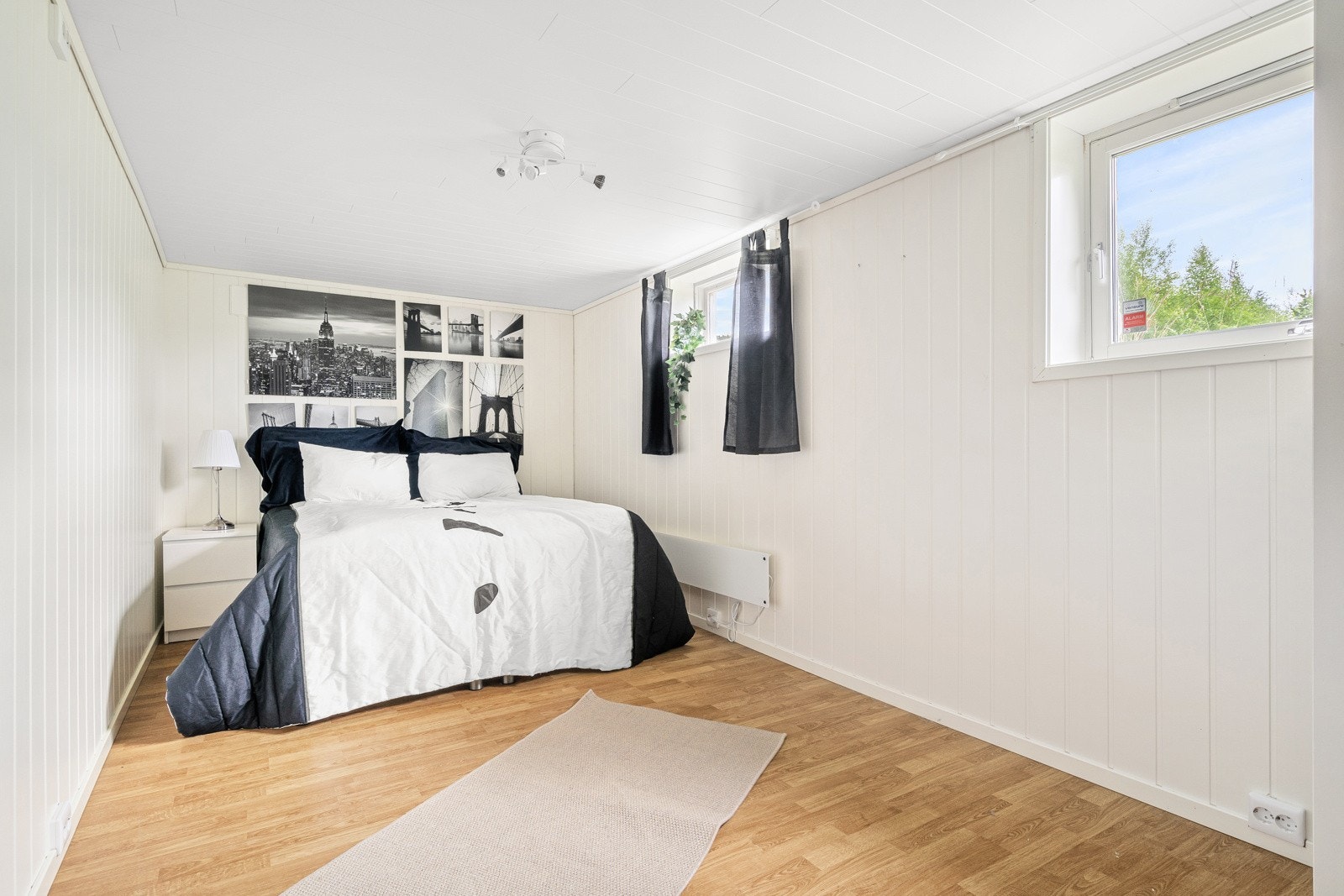 Rom i kjeller som i dag blir brukt som soverom. Galleribilde