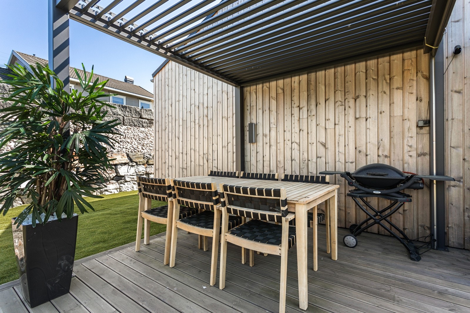Fin uteplass med pergola Galleribilde
