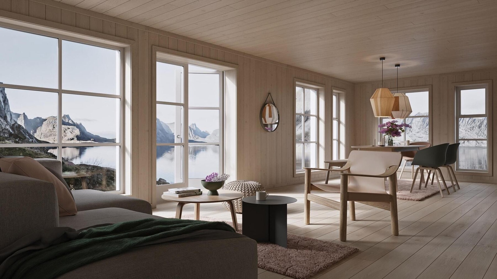 Store vinduer slipper lyset og naturen inn i stua. illustrasjonsfoto Galleribilde