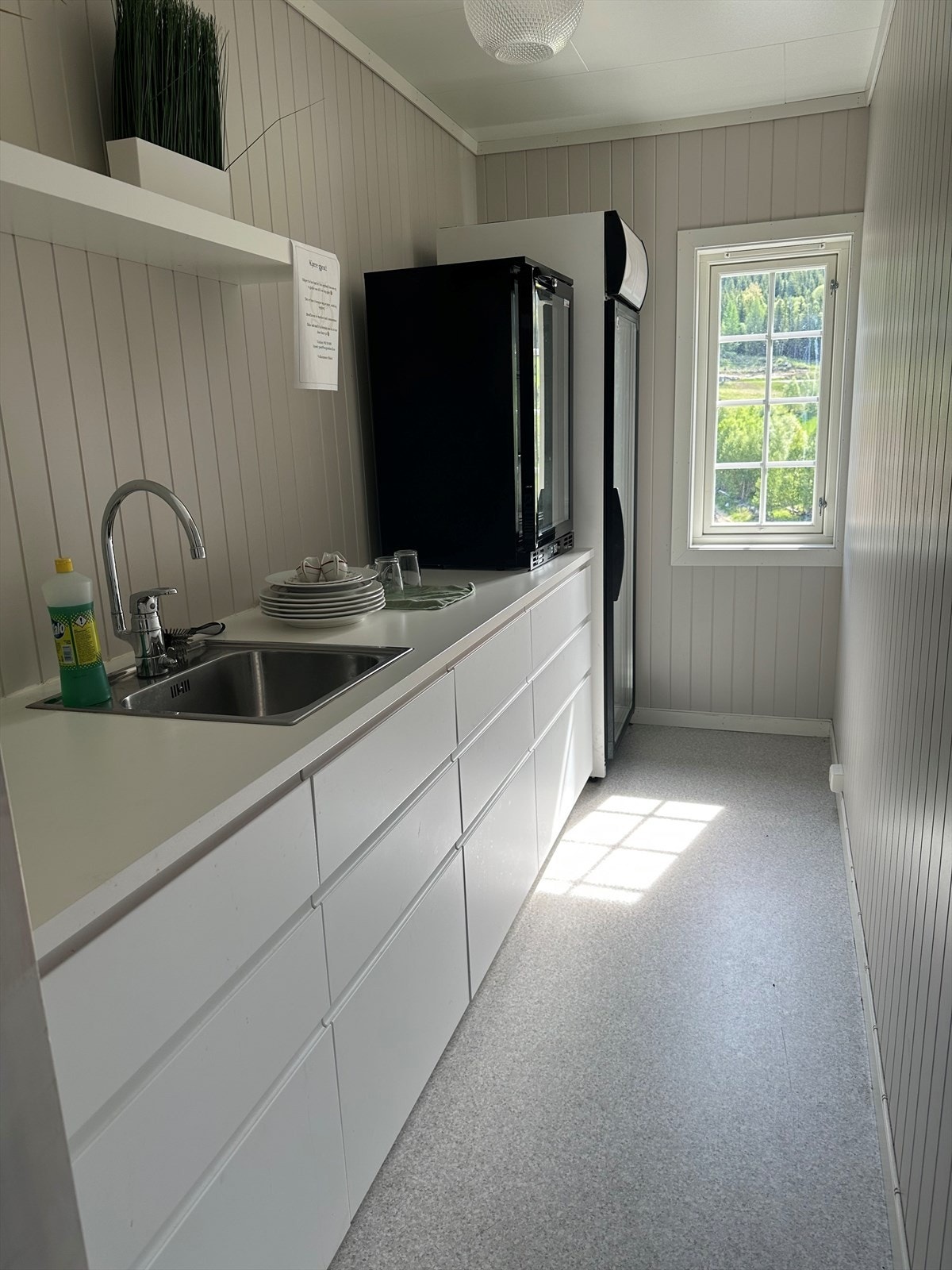 Felles kjøkken til hotellets gjester Galleribilde