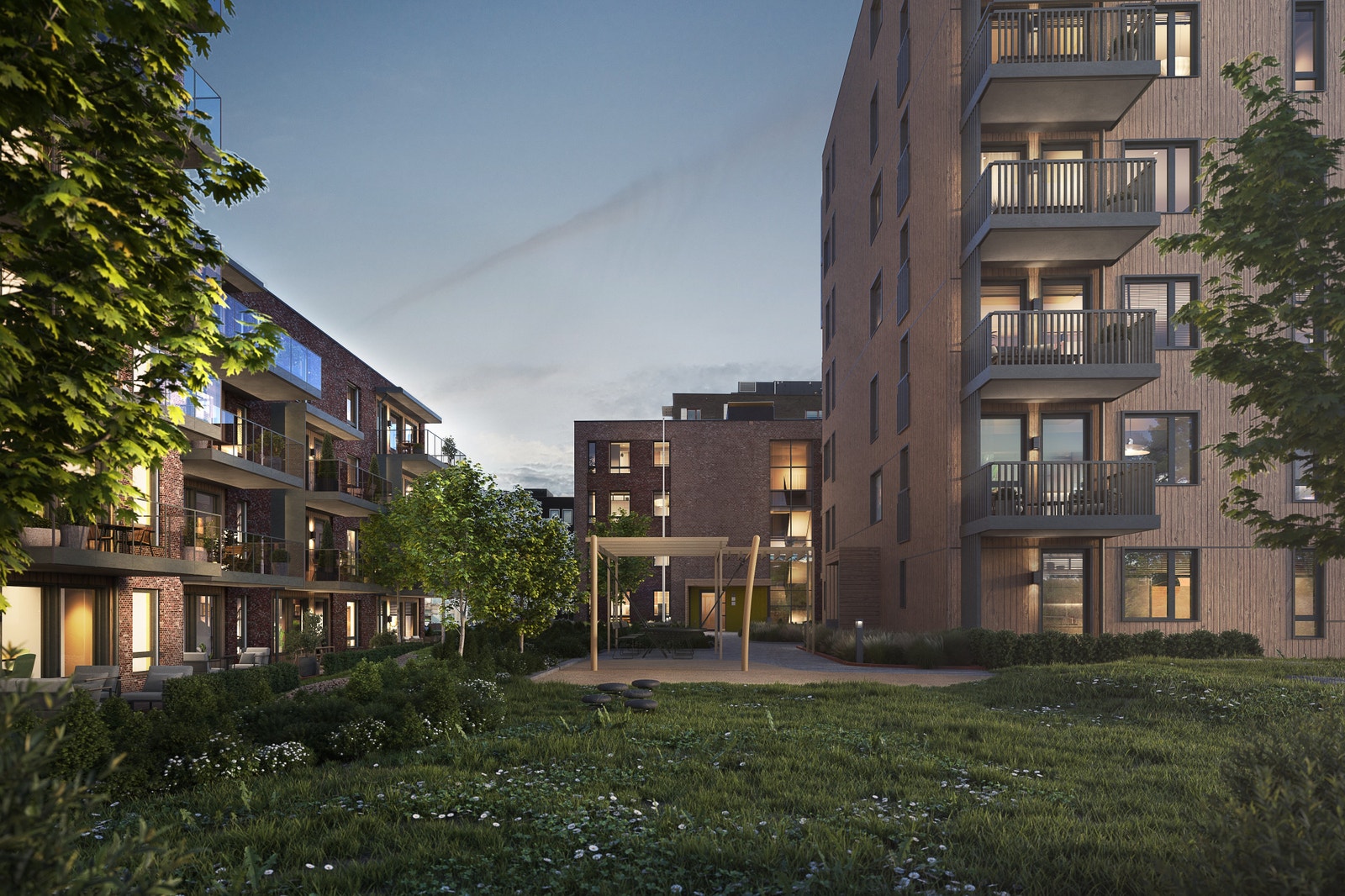 Innbydende og koselig tun mellom husene. Hus 7 er lengst bak, hus 8 til høyre og hus 9 til venstre. Galleribilde