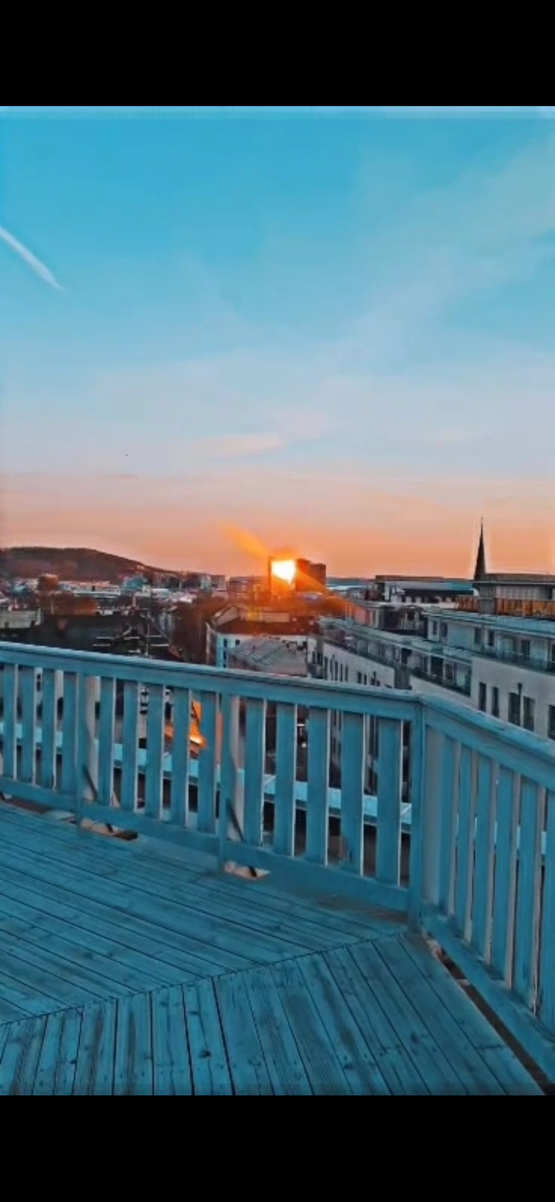 Solnedgang fra taket captured by Vebjørn Galleribilde