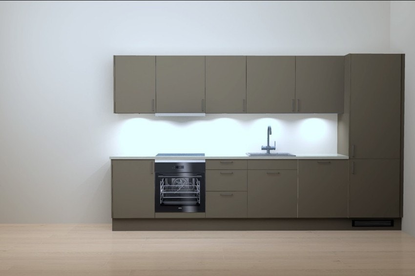 Innredningen er fra Sigdal med fronter i fargen høst og håndtak av type Retro HK000299. Solid benkeplate i laminat betong 558 og underlimt servant med blandebatteri i blank. Illustrasjon er av selve kjøkkeninnredning som er valgt. Galleribilde