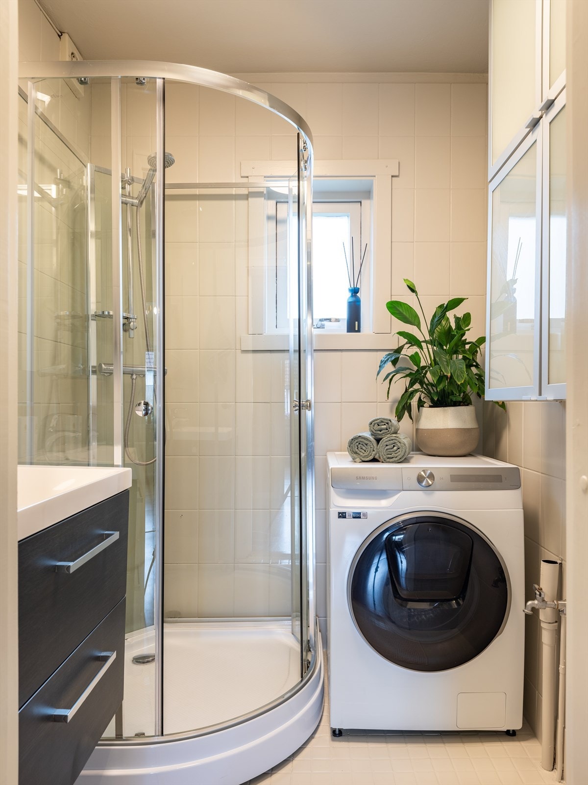 Badet har opplegg for vaskemaskin. Galleribilde