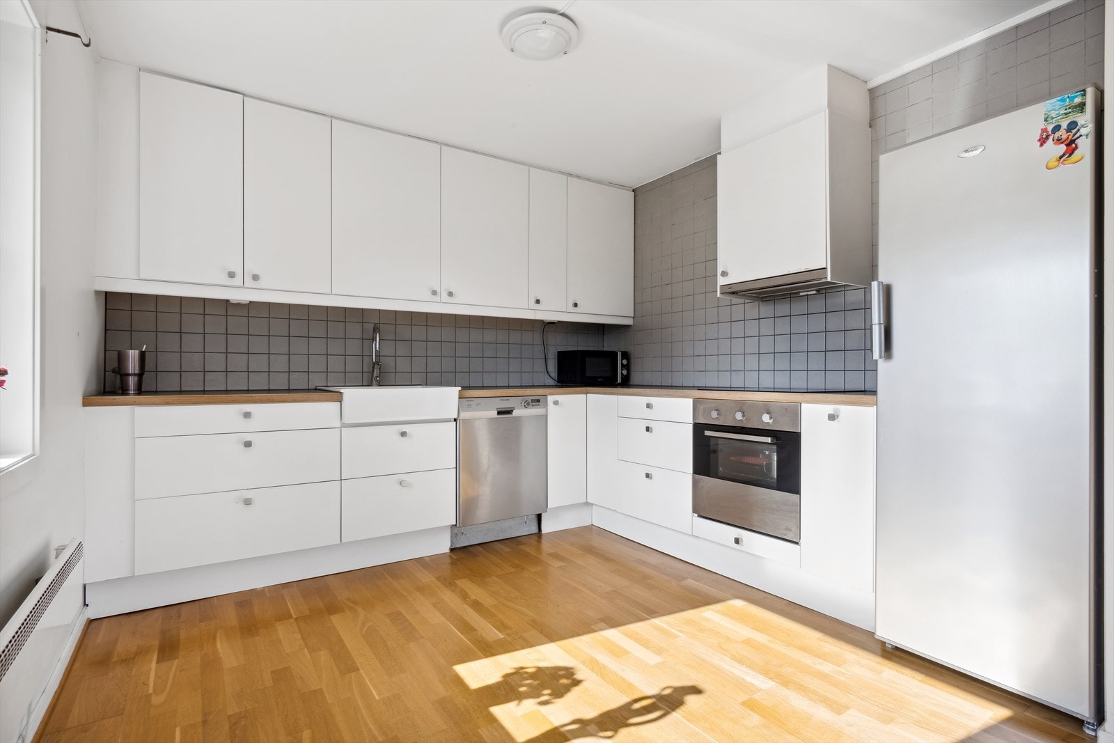 Lyst og trivelig kjøkken Galleribilde