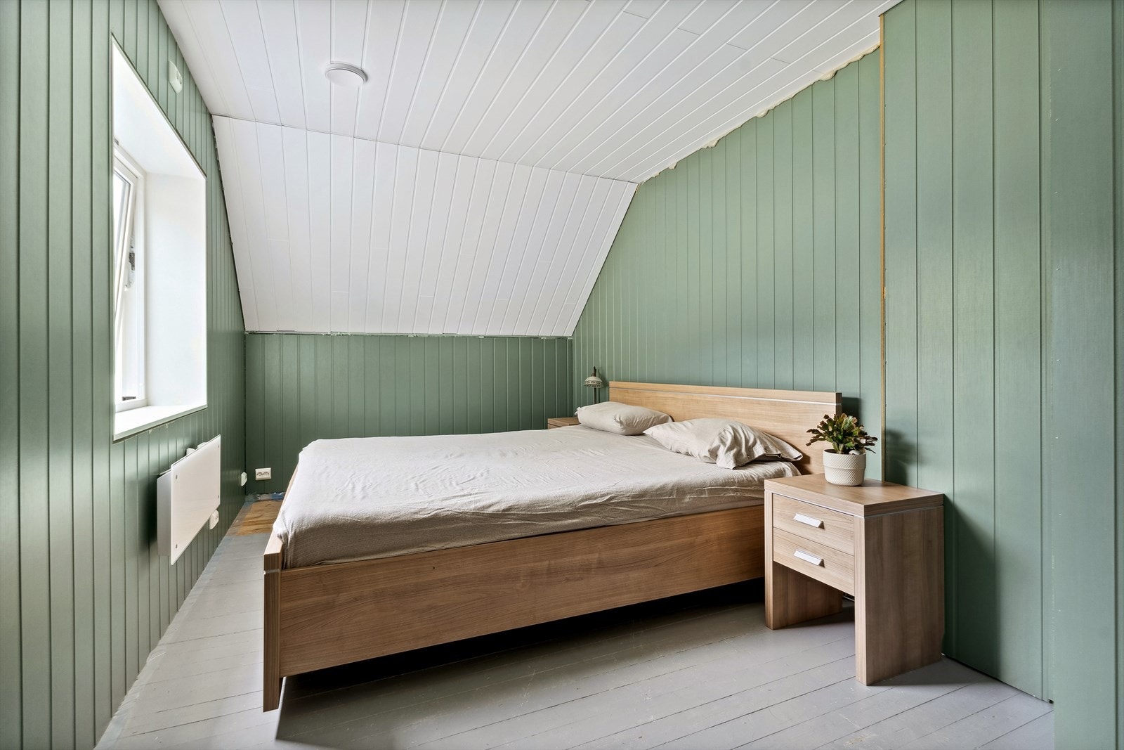 Alle romma er malt i duse og behagelege fargetonar. Galleribilde