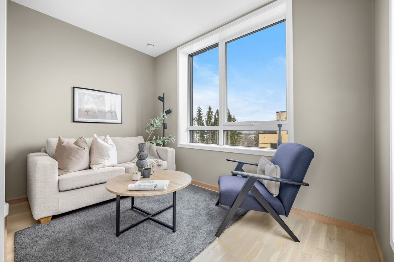 Stue i toppetasjen. Bilde fra en annen bolig i prosjektet med samme planløsning. Galleribilde