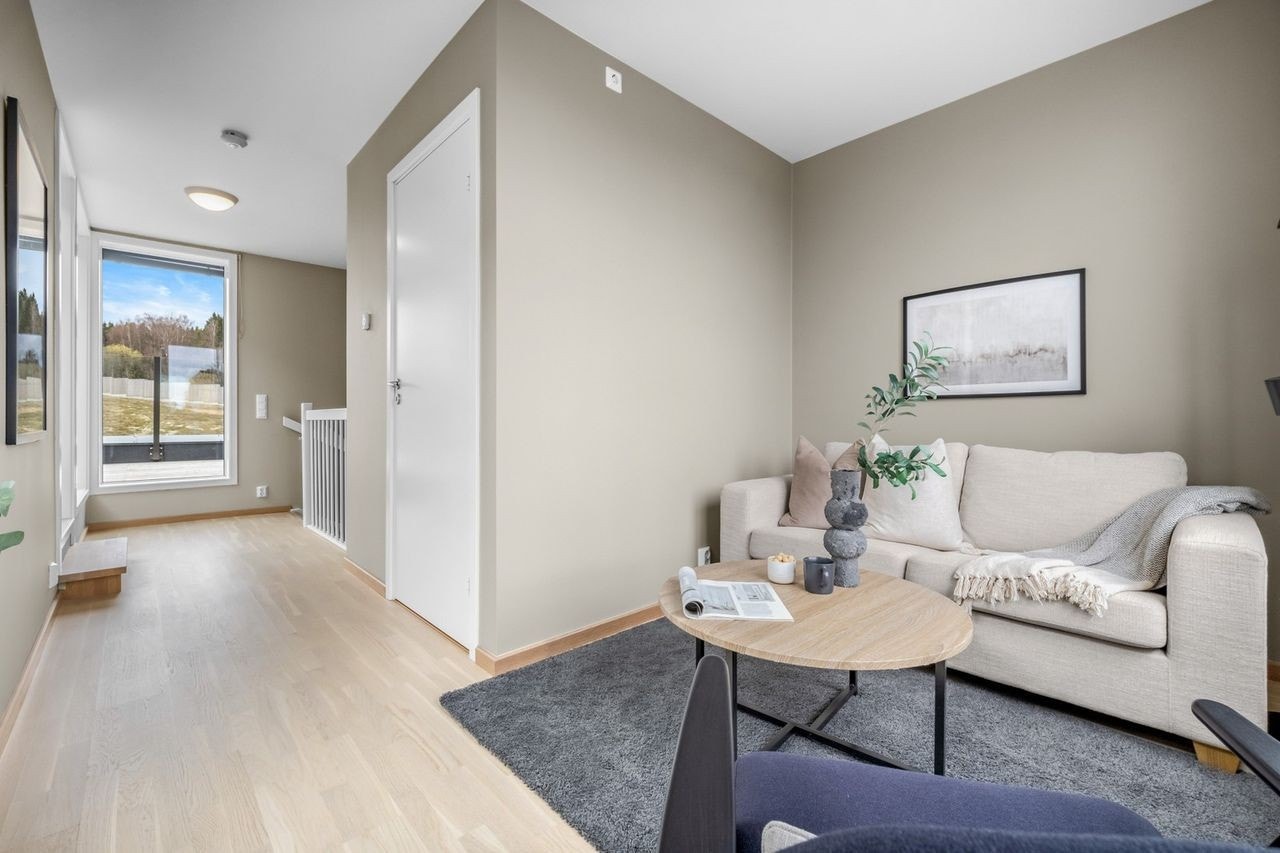 Stue i toppetasjen. Bilde fra en annen bolig i prosjektet med samme planløsning. Galleribilde