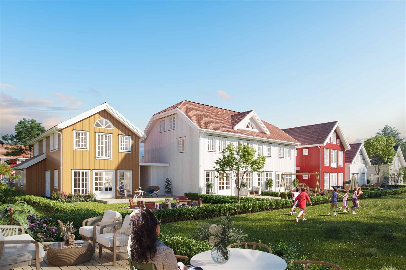 Det store bygget i midten er firemannsbolig (5-8), gult hus er nr. 4, mens rødt hus er nr 9. Galleribilde