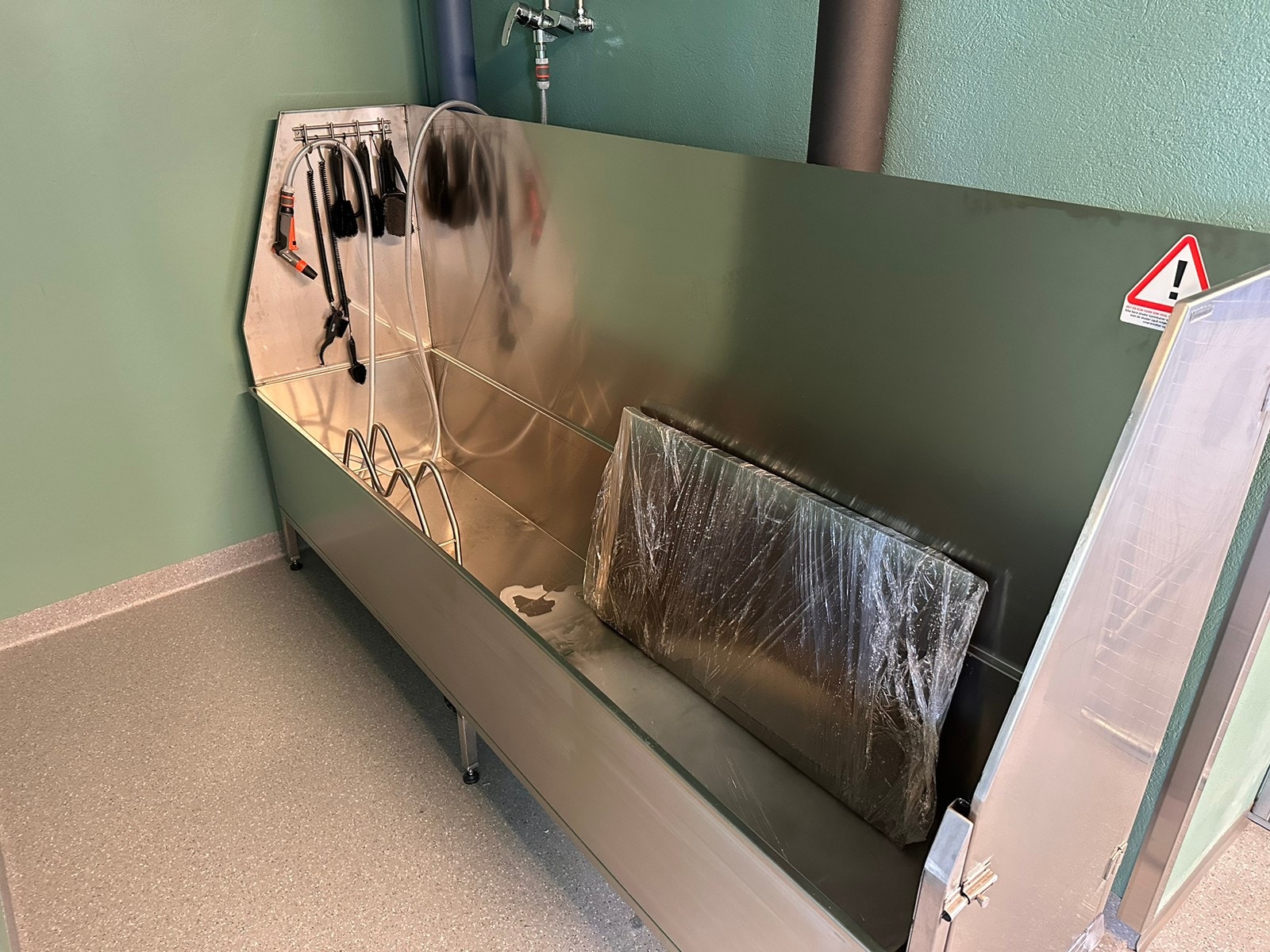 Dusj for vask av sykkel. Galleribilde