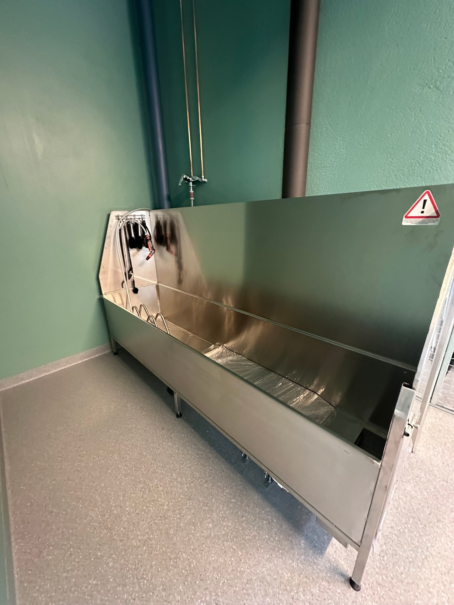 Praktisk opplegg for vask av sykkel i sykkelboden Galleribilde