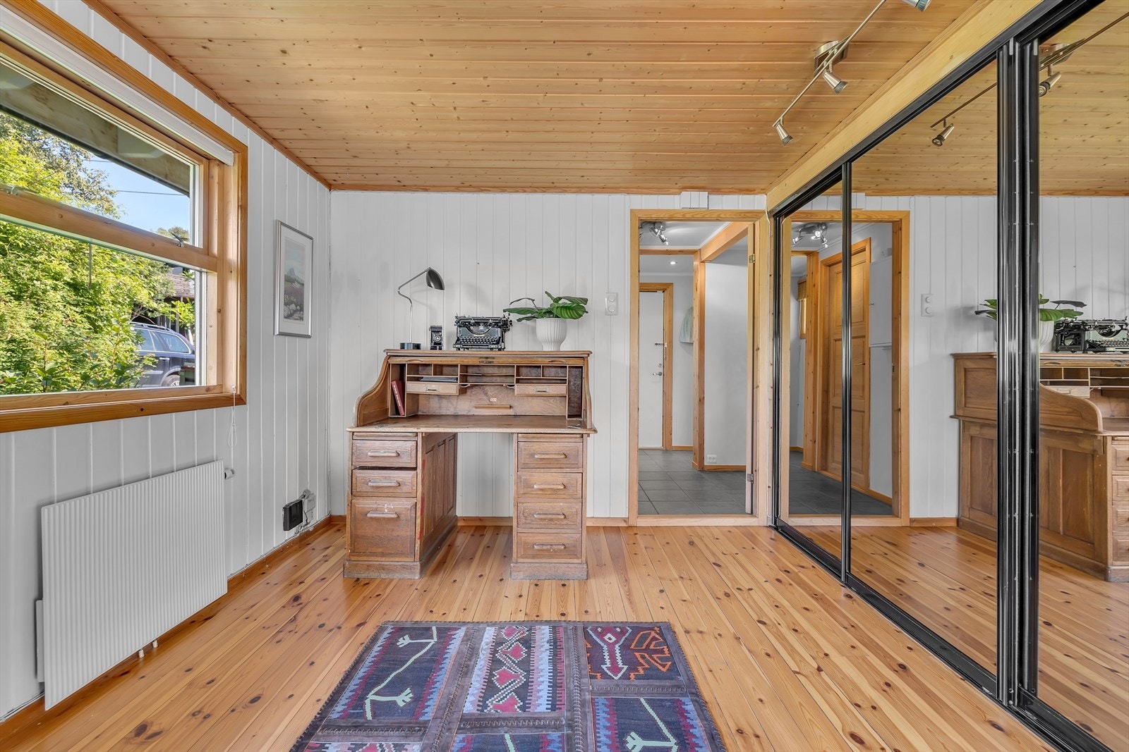 Vannbåren radiator og gulvvarme i boligen. Galleribilde