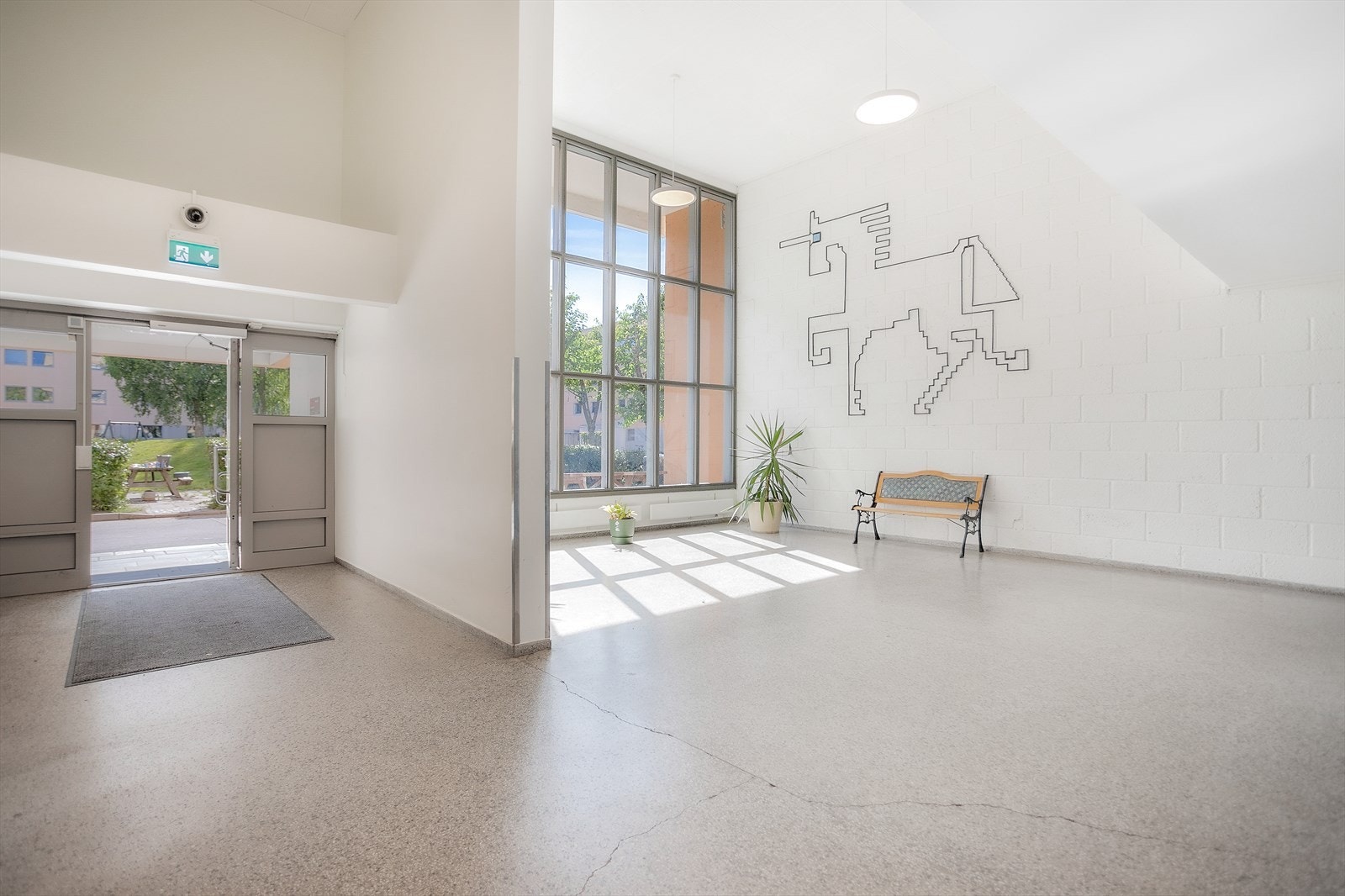 Lyst og innbydende inngangsparti Galleribilde