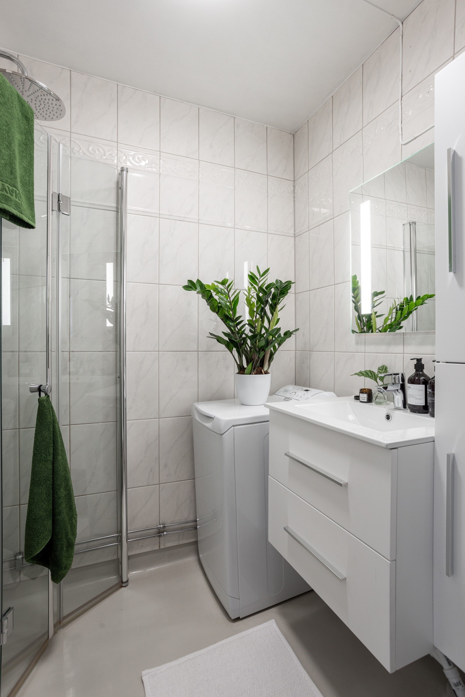 Badet har opplegg for vaskemaskin. Galleribilde